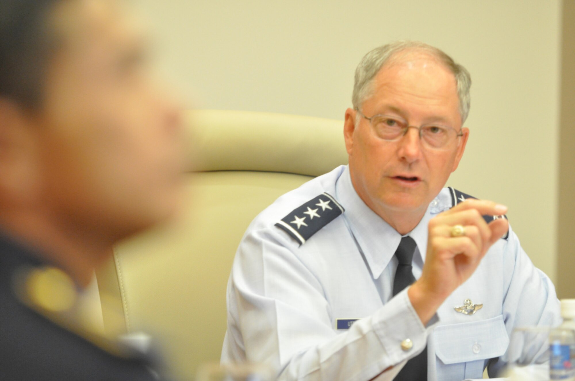 Lt. Gen. Chip Utterback, 13th Air Force commander, briefs seven members of the Vietnam National Search and Rescue Committee June 2 at Hickam Air Force Base, Hawaii. The group met with Pacific Air Forces leadership to discuss several upcoming humanitarian and search and rescue exercises taking place in Vietnam. (U.S. Air Force photo/Tech. Sgt. Cohen A. Young)