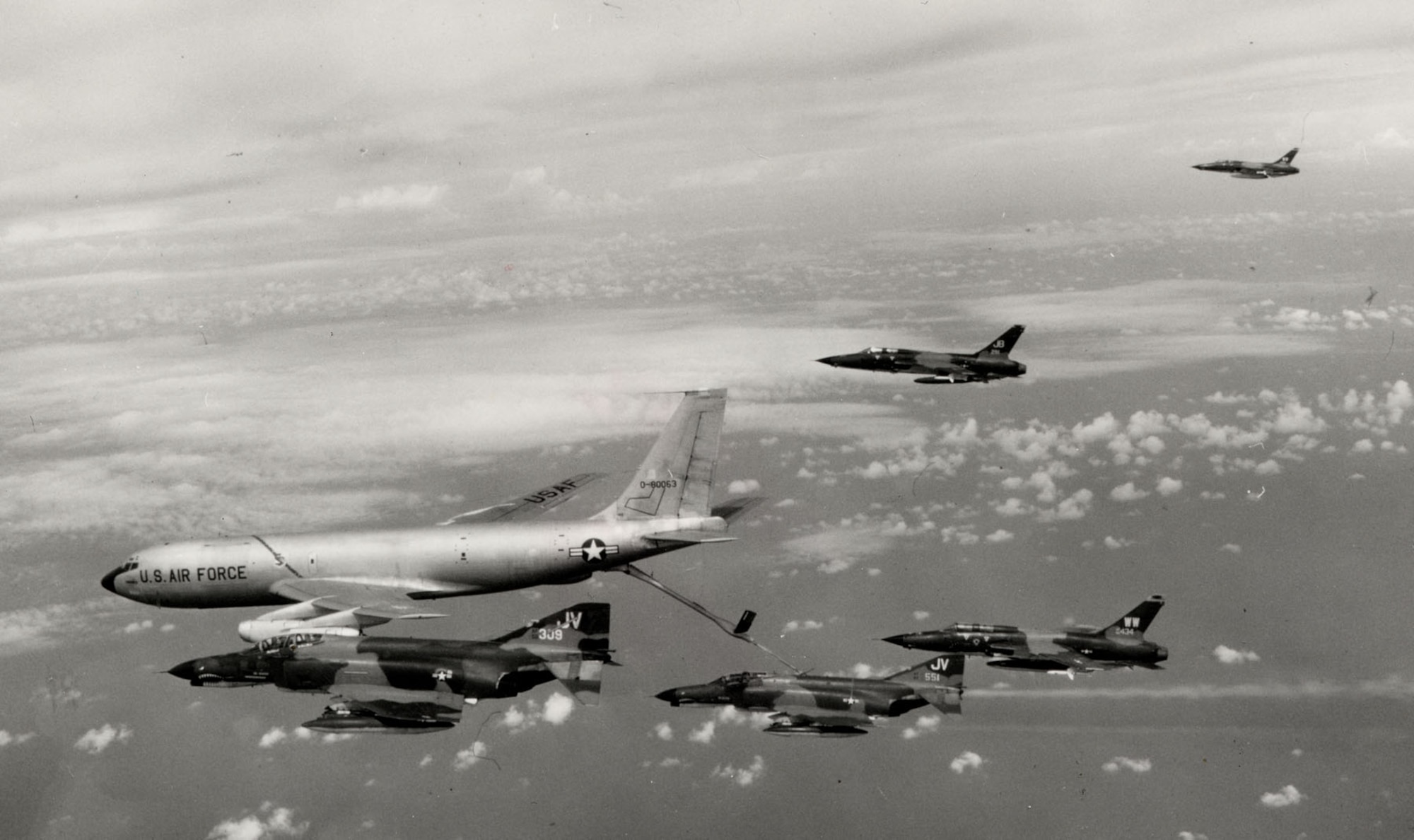 Hunter killer group of F-105G Wild Weasels and F-4Es take fuel on the way to North Vietnam for a LINEBACKER strike in the summer of 1972. (U.S. Air Force photo)