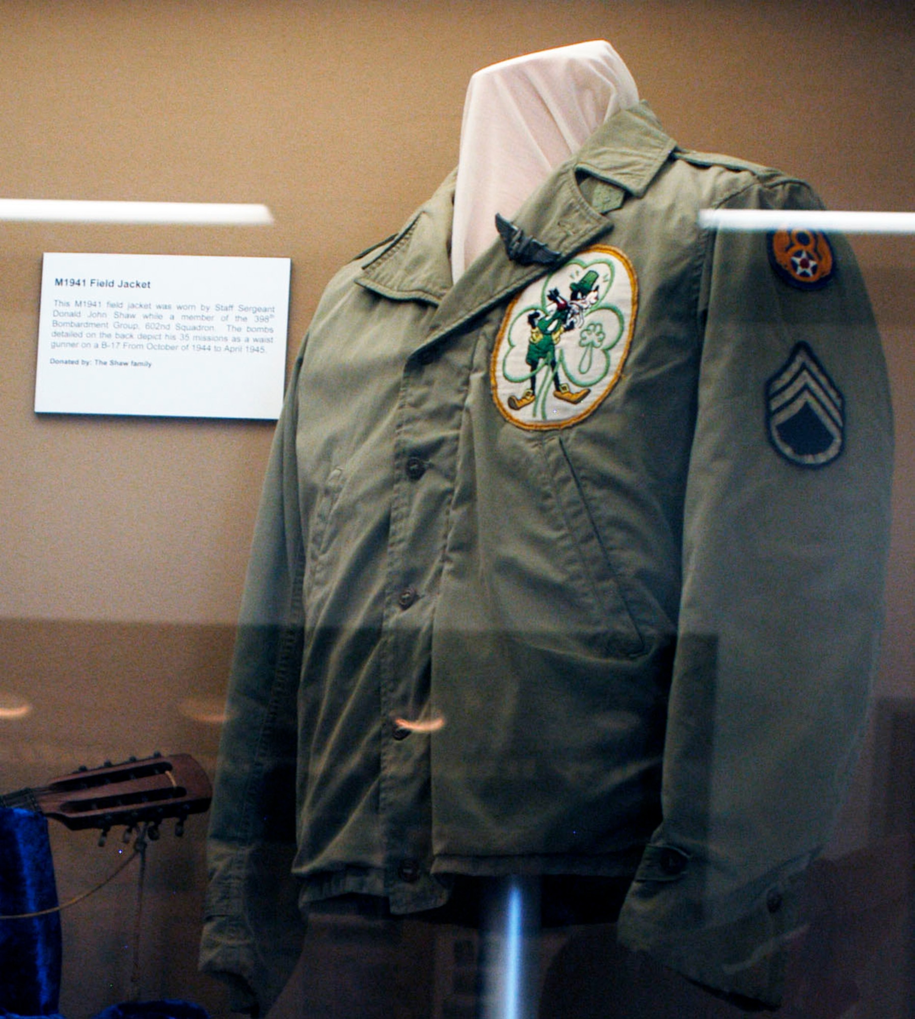This M1941 field jacket was worn by Staff Sgt. Donald John Shaw while a member of the 398th Bombardment Group, 602nd Squadron. The bombs detailed on the back depict his 35 missions as a waist gunner on a B-17 from October 1944 to April 1945. (U.S. Air Force photo)