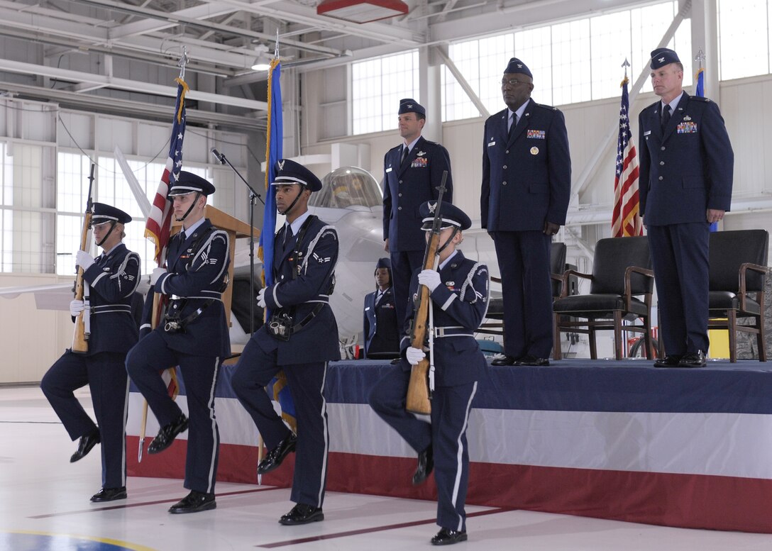 LANGLEY AIR FORCE BASE, Va. -- An honor guard team marches into place during the 1st Maintenance Group change of command ceremony here June 5.  Col. George A. Zaniewski assumed command from Col. Tyrone A. Strachan.  (U.S. Air Force photo/Airman 1st Class Jonathan Koob)