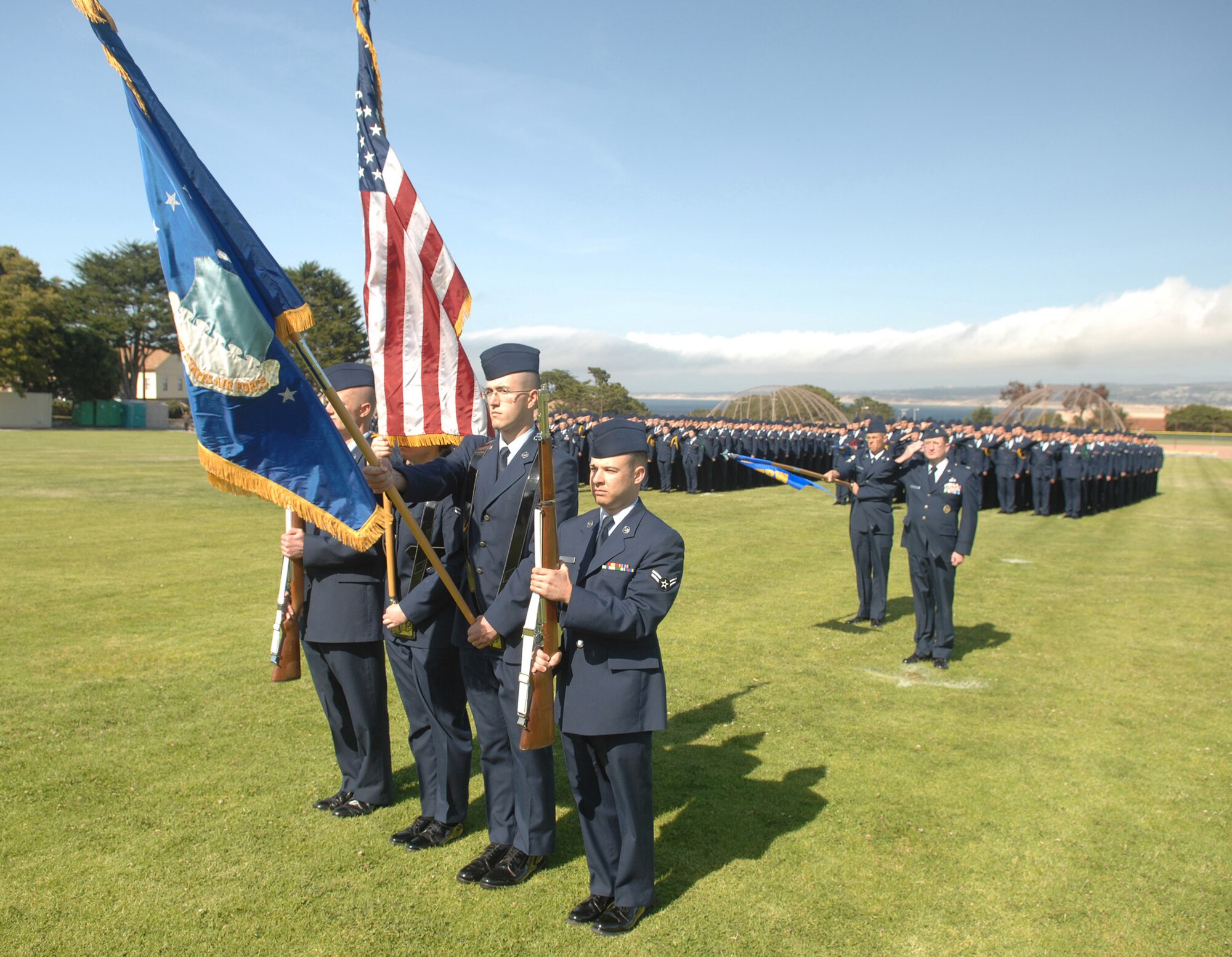 Technical training student Airmen form an honor guard displaying the colors at the stand-up of the 517th Training Group at the Presidio of Monterey, Calif., May 15. The 517 TRG will encompass the 311th and 314th Training Squadrons and replaces the Air Force Element. (U.S. Air Force photo by Tech. Sgt. John Barton)