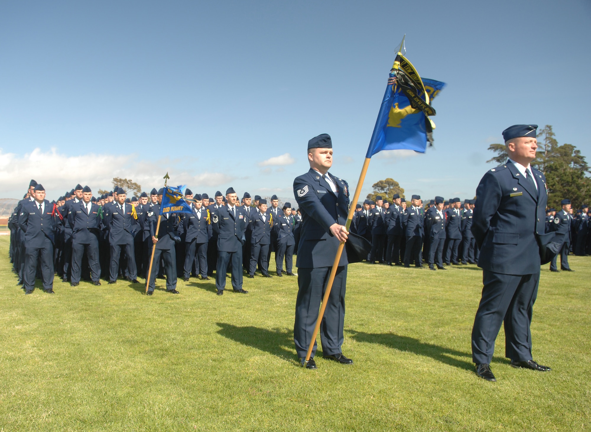Members of the 311th Training Squadron stand at parade rest prior to the stand-up of the 517th Training Group at the Presidio of Monterey, Calif., May 15. The 517 TRG will encompass the 311th and 314th Training Squadrons and replaces the Air Force Element. (U.S. Air Force photo by Tech. Sgt. John Barton)