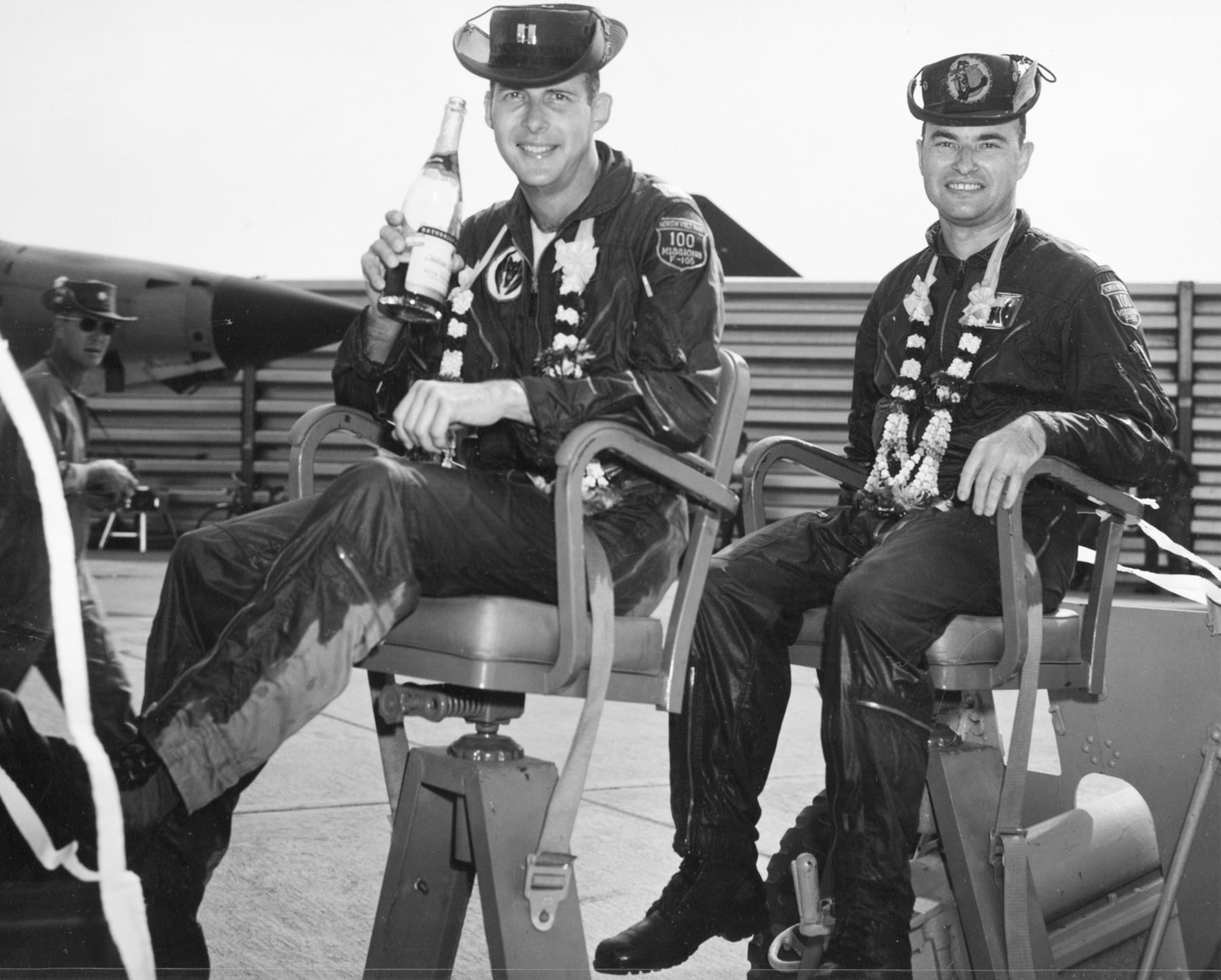 Capt. Dorrough (l) and his EWO, Maj. Clarence “Bud” Summers, celebrating the completion of 100 missions over North Vietnam. (U.S. Air Force photo)