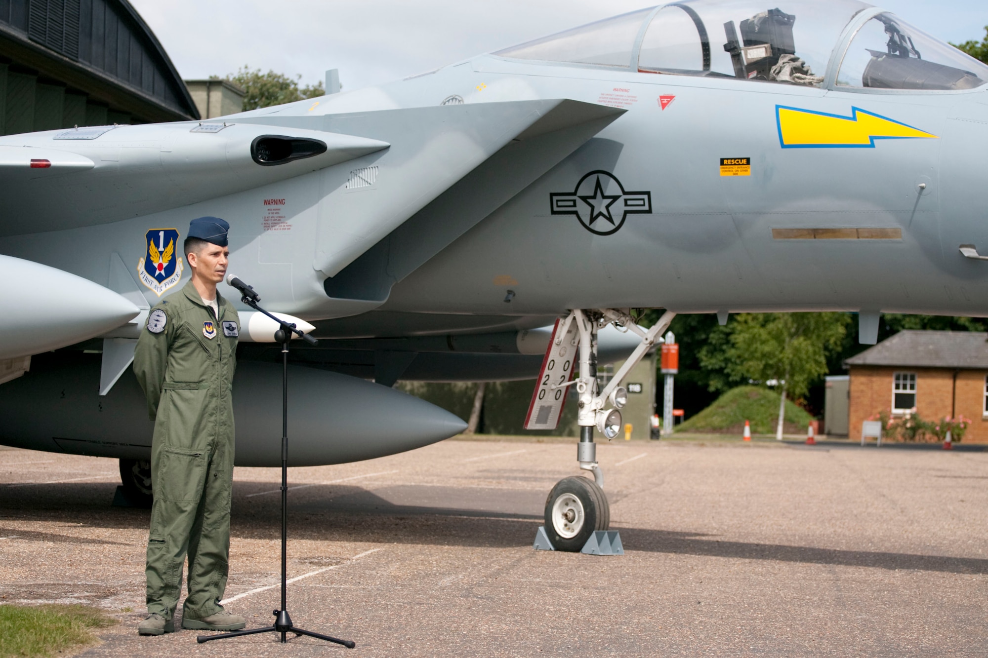 Col. John Quintas, 48th Operations Group commander, thanks the team of volunteers who repainted an F-15A aircraft for display in the Imperial War Museum Duxford June 5, 2009. The Airmen from RAF Lakenheath’s 48th Equipment Maintenance Squadron corrosion control flight, volunteered approximately 70 hours each of off-duty time over a period of eight weeks to restore the aircraft to its original 5th Fighter Intercept Squadron markings. (Photo courtesy of Fairhurstphotography)