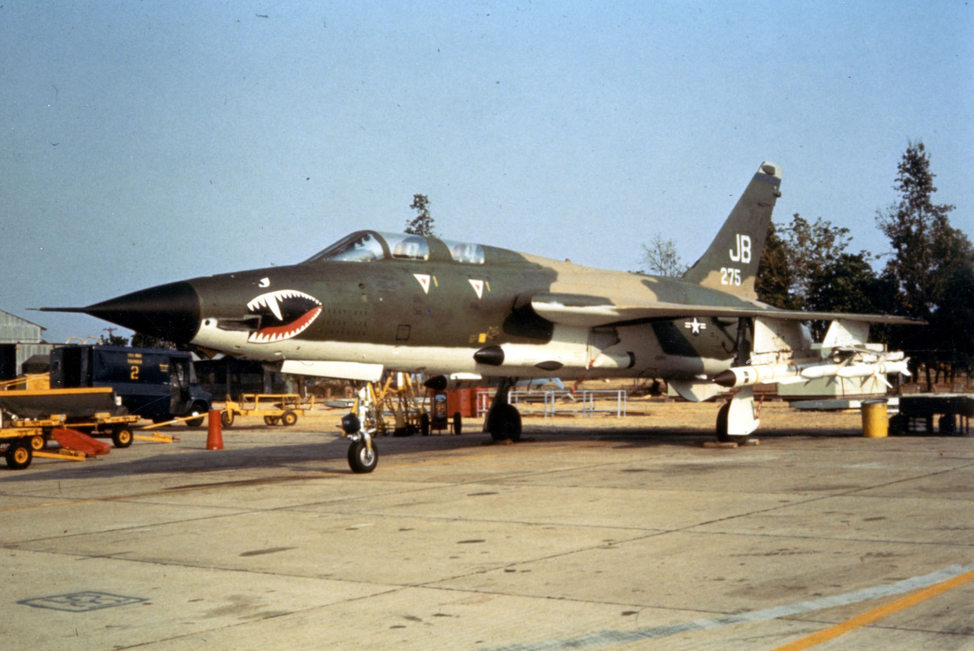 This photograph of an F-105G armed with two AGM-78s and four Shrikes on two dual launchers was dropped as a leaflet on SAM sites to intimidate the crews. Although dual launchers were available, the Wild Weasels rarely used them because they vibrated heavily if only one Shrike was fired. (U.S. Air Force photo)