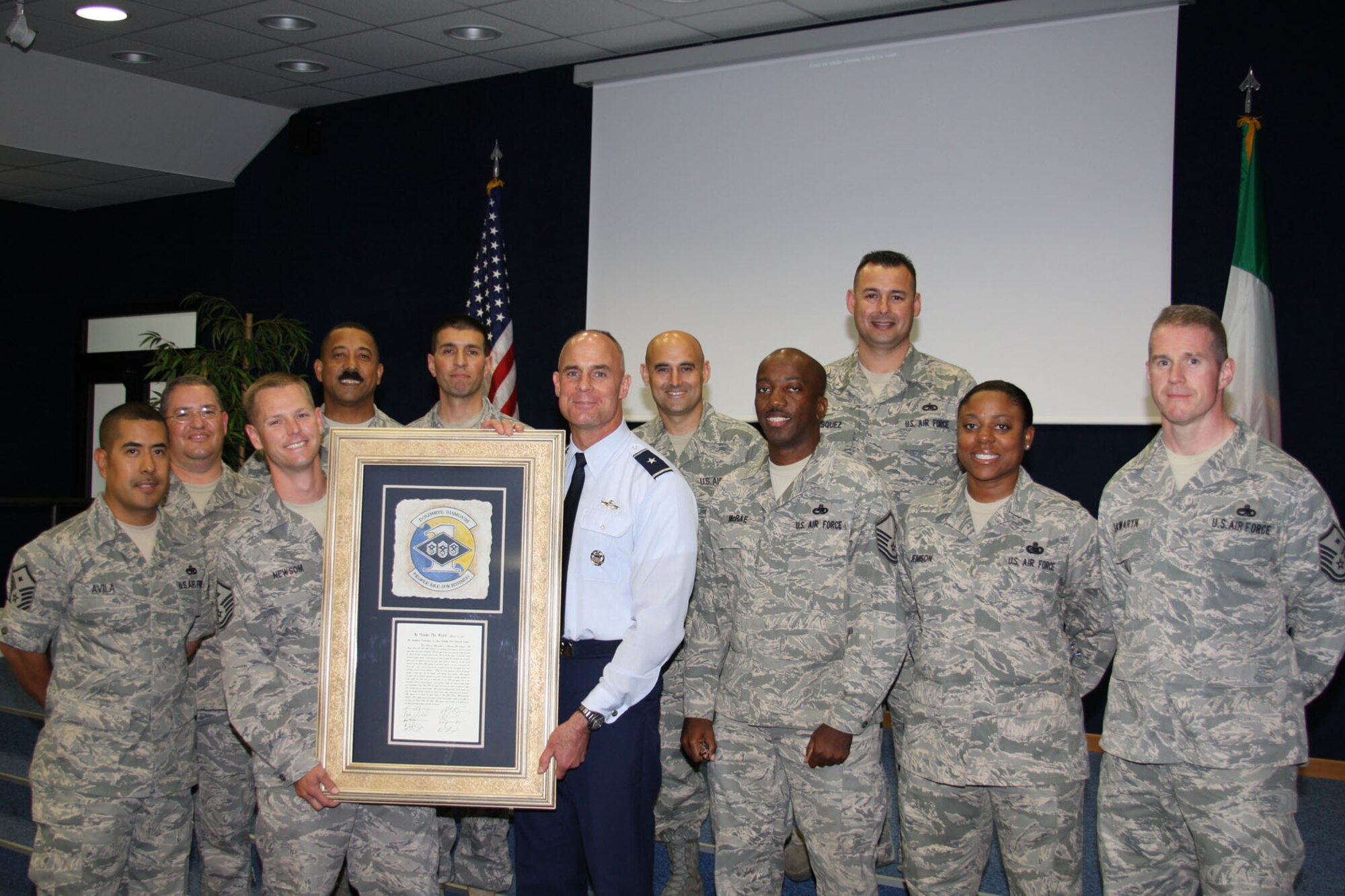 The Aviano First Sergeants Council bestowed upon Brig. Gen. Craig Franklin,
31st Fighter Wing commander, the title of 'Honorary First Sergeant' for his
leadership during his last presentation to Airmen Leadership School students
at Aviano Air Base, Italy, June 4, 2009.  This title was given to General
Franklin for his sincerity, compassion and love which he brought to all
Airmen issues. (U.S. Air Force photo/Senior Airman Veronica Condrey)