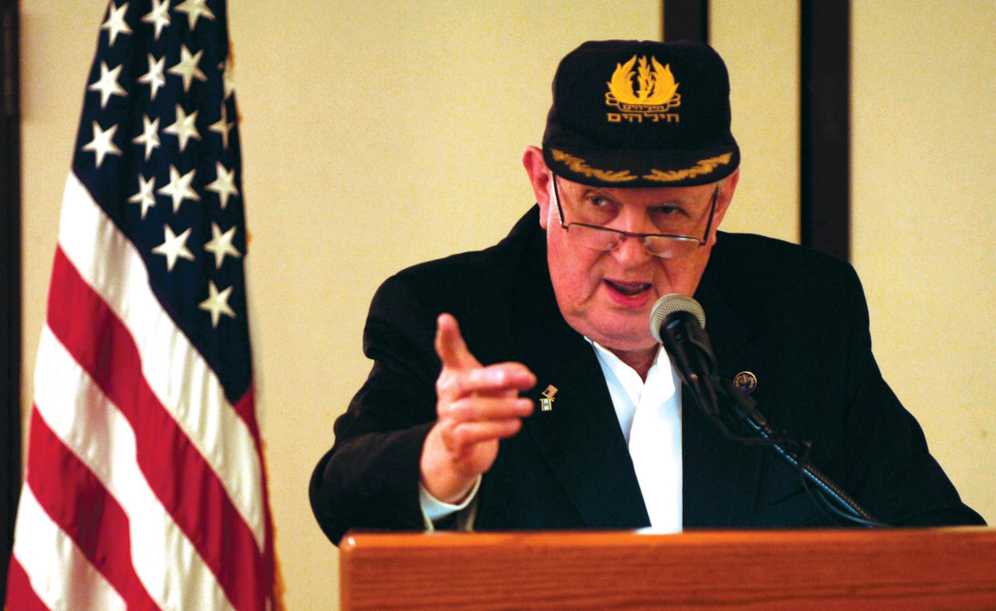 General (ret.) Aryeh Leib “Eugene” Lebovitz, Holocaust survivor, speaks during the Holocaust Memorial Luncheon held at The Club at Andrews Tuesday. General Lebovitz spoke about his experiences in concentration camps, surviving a firing squad, and being a translator for the Hungarian military. (U.S. Air Force photo/ Senior Airman Steven R. Doty)