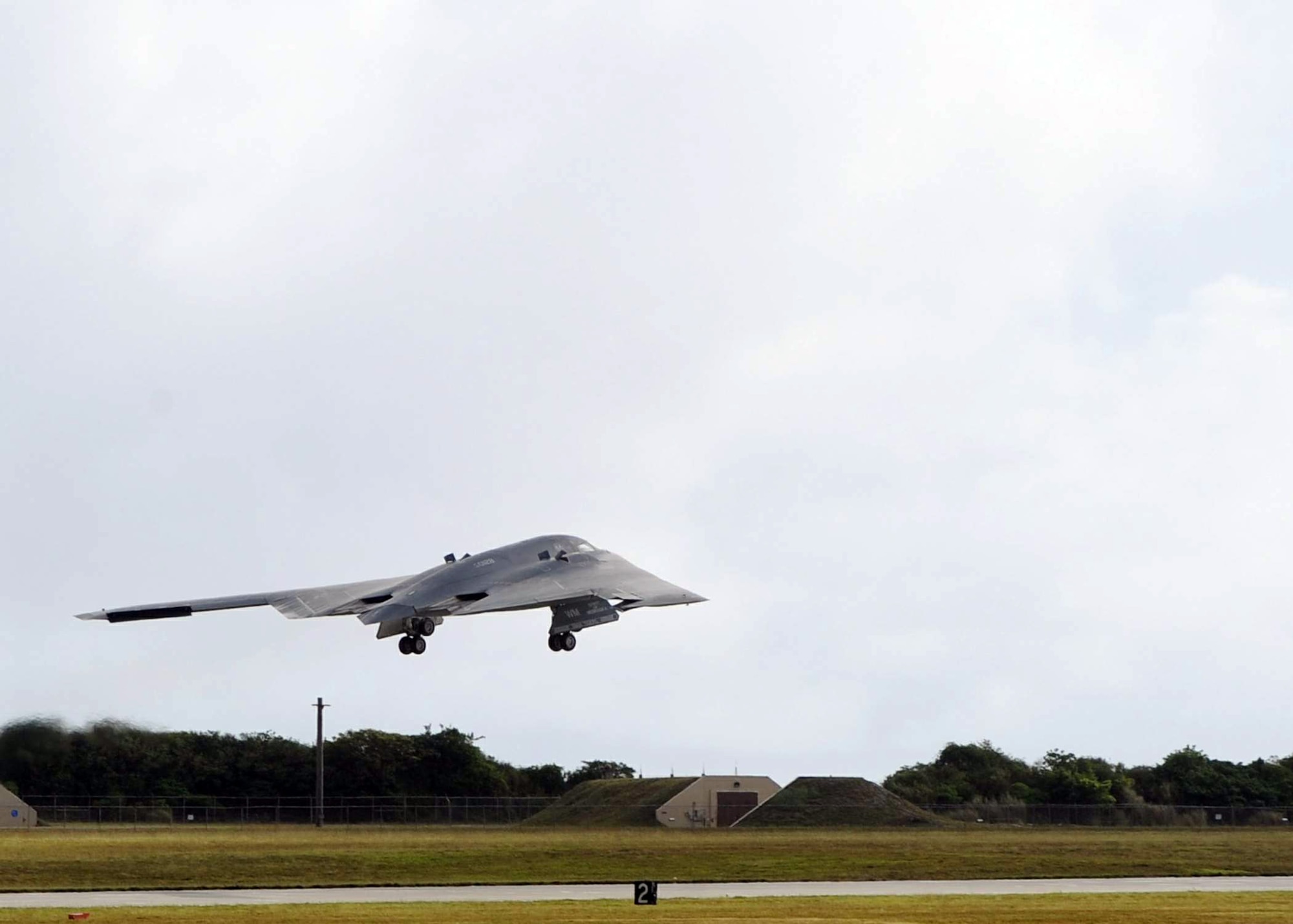A B-2 Spirit takes off from Andersen Air Force Base, Guam, as part of the redeployment June 2 to Whiteman Air Force Base, Mo. B-52 Stratofortresses replaced the B-2s as part of the continuous bomber presence in the Western Pacific. (U.S. Air Force photo/Senior Airman Christopher Bush) 
