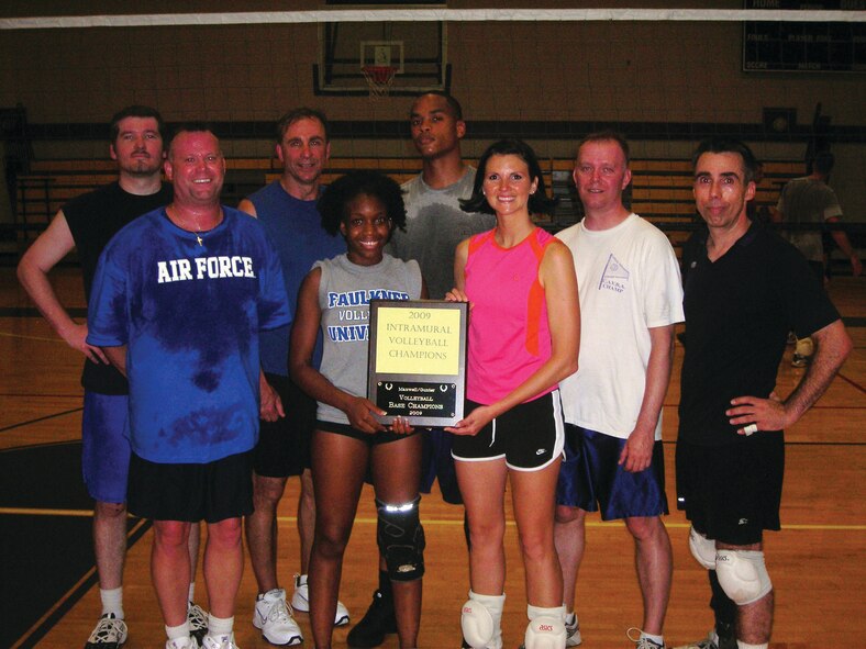 A hard-spiking team from Gunter's Electronic Logistics Systems Group won the Maxwell-Gunter's intramural volleyball championship Tuesday night, surviving the loser's bracket. ELSG had to beat Air Command and Staff College One twice to claim the trophy. Pictured are (from left) Richard Aldridge, Danielle Petty, Capt. Autumn Lorenz, Tech. Sgt. Russell Wroten, Dana Brasie, (back from left) John Morton, Robert Goerke and Senior Airman Ollie Bradley. Not shown are coach Staff Sgt. Michael Williams, Senior Airman Joshua Fuqua, Stephen Siler and Senior Master Sgt. William Corino. (Courtesy photo)