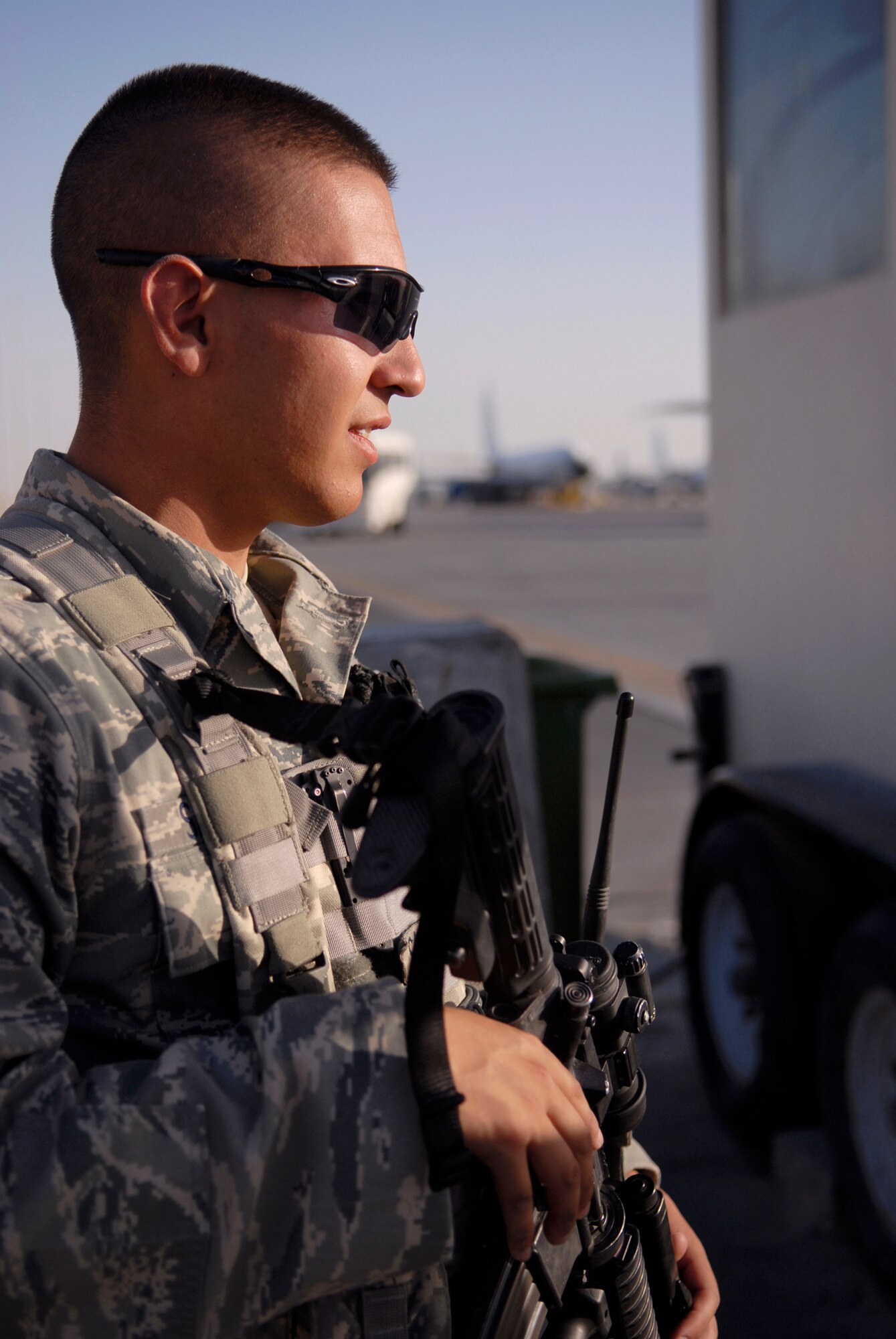Airman 1st Class Christopher Salazar, 379th Expeditionary Security Forces Squadron entry controller, monitors the entry and exit to the flightline at his entry control point, Jun 4, 2009, at an undisclosed location in Southwest Asia.  Airman Salazar ensures that personnel who are attempting to gain access to the flightline have authorization to do so.  Airman Salazar hails from Colorado Springs, Colo. and is deployed from Royal Air Force Mildenhall, England, in support of Operations Iraqi and Enduring Freedom and Combined Joint Task Force - Horn of Africa.  (U.S. Air Force photo/Senior Airman Andrew Satran/released) 
