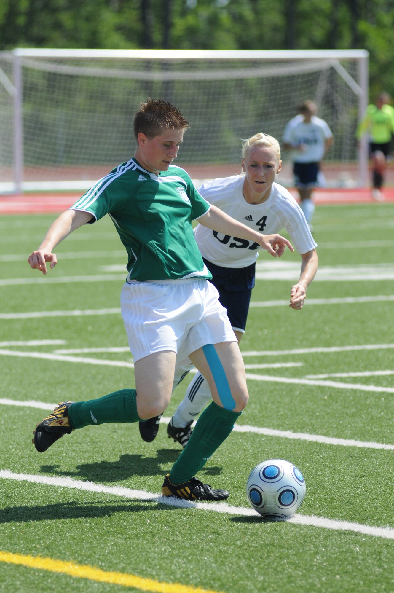 The United States and Germany compete during the 5th CISM Women’s Soccer Championship at Biloxi High School Stadium 6 June.  The CISM tournament, hosted by Keesler Air Force Base, includes teams from Brazil, Canada, France, Germany, The Netherlands, The Republic of South Korea and the United States.  Matches are being held June 6 to 13, with the Gold match June 13 at 2 p.m.  Organizers say the tournament gives teams and people who attend a chance to develop bonds and life-long friendships between the countries and a chance to learn about one another’s cultural similarities and differences.  (U.S. Air Force photo by Kemberly Groue)
