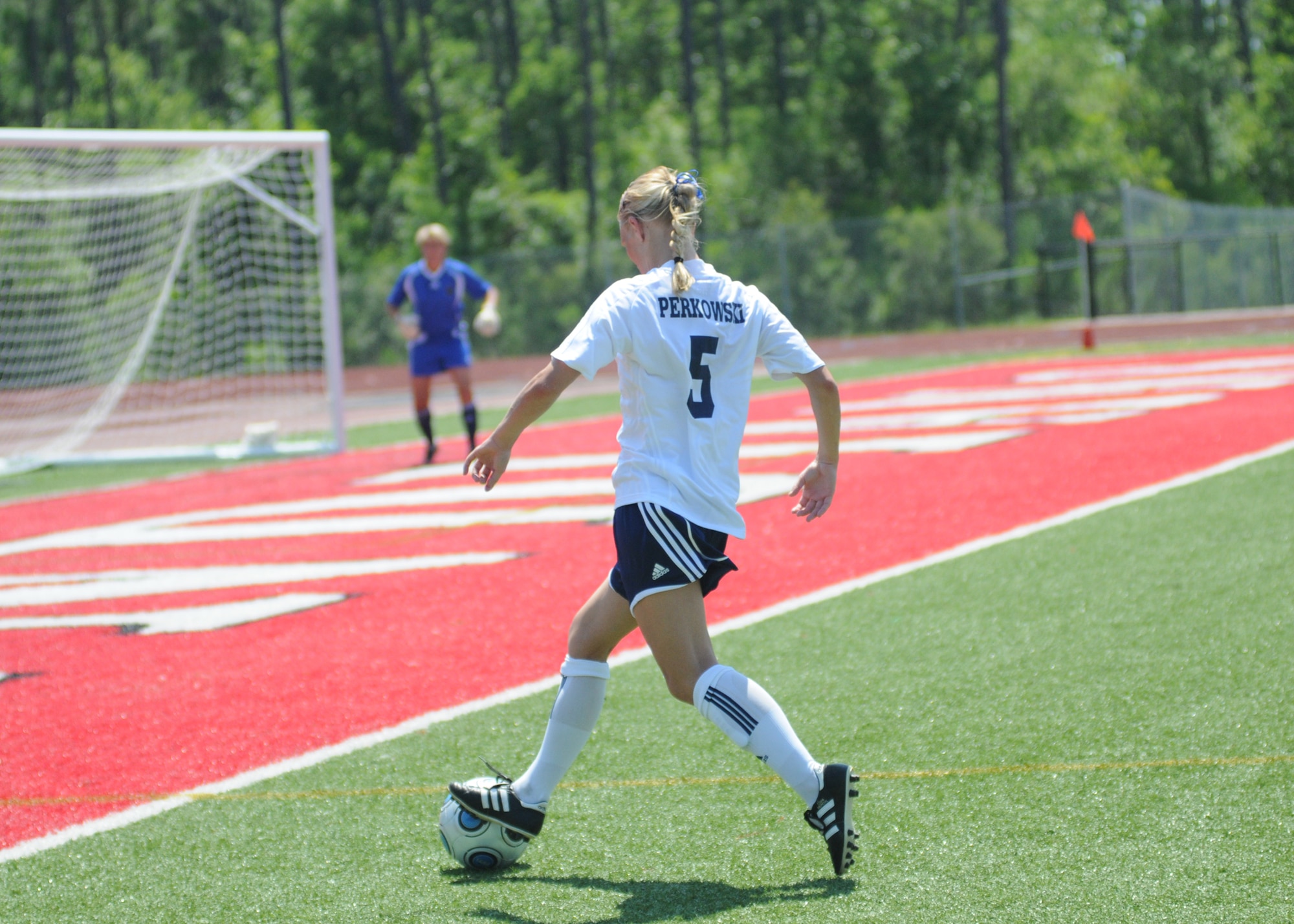 The United States and Germany compete during the 5th CISM Women’s Soccer Championship at Biloxi High School Stadium 6 June.  The CISM tournament, hosted by Keesler Air Force Base, includes teams from Brazil, Canada, France, Germany, The Netherlands, The Republic of South Korea and the United States.  Matches are being held June 6 to 13, with the Gold match June 13 at 2 p.m.  Organizers say the tournament gives teams and people who attend a chance to develop bonds and life-long friendships between the countries and a chance to learn about one another’s cultural similarities and differences.  (U.S. Air Force photo by Kemberly Groue)