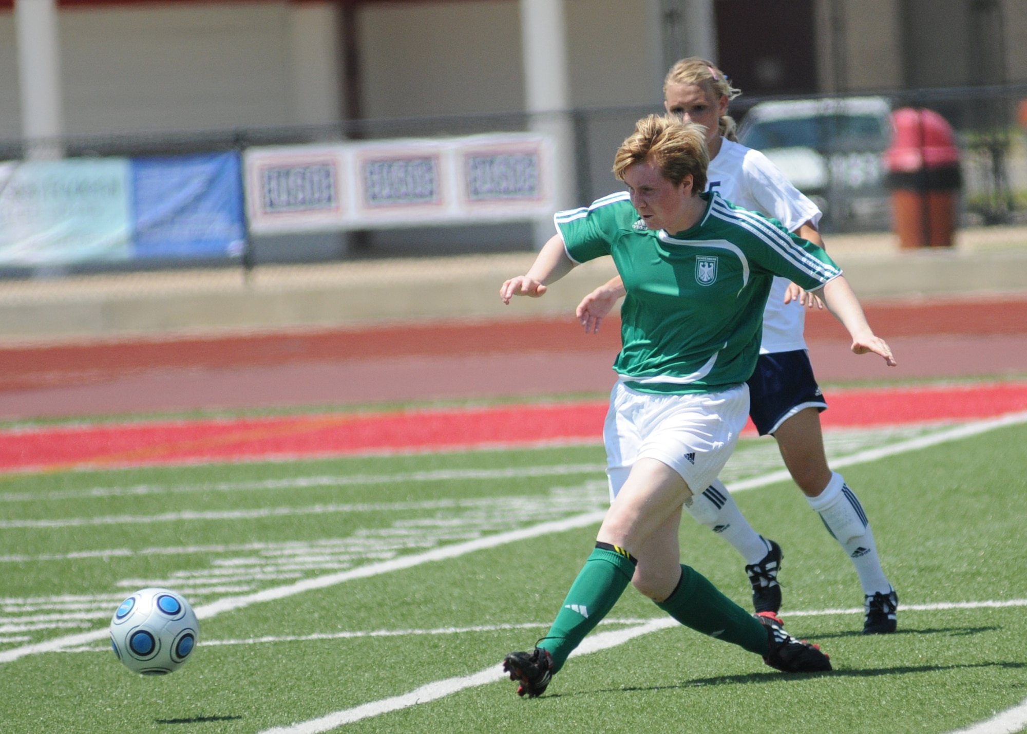 The United States and Germany compete during the 5th CISM Women’s Soccer Championship at Biloxi High School Stadium 6 June.  The CISM tournament, hosted by Keesler Air Force Base, includes teams from Brazil, Canada, France, Germany, The Netherlands, The Republic of South Korea and the United States.  Matches are being held June 6 to 13, with the Gold match June 13 at 2 p.m.  Organizers say the tournament gives teams and people who attend a chance to develop bonds and life-long friendships between the countries and a chance to learn about one another’s cultural similarities and differences.  (U.S. Air Force photo by Kemberly Groue)