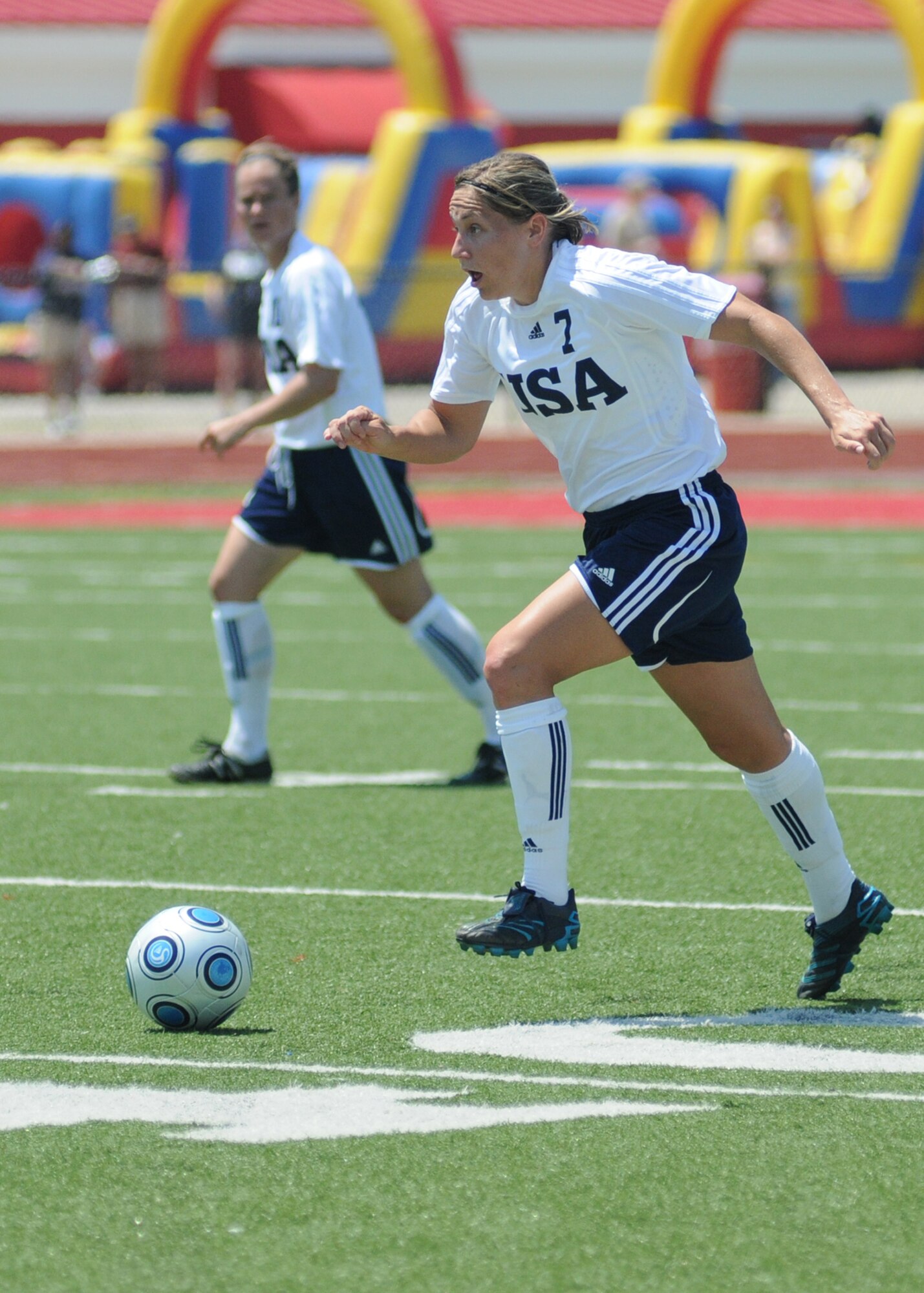 The United States and Germany compete during the 5th CISM Women’s Soccer Championship at Biloxi High School Stadium 6 June.  The CISM tournament, hosted by Keesler Air Force Base, includes teams from Brazil, Canada, France, Germany, The Netherlands, The Republic of South Korea and the United States.  Matches are being held June 6 to 13, with the Gold match June 13 at 2 p.m.  Organizers say the tournament gives teams and people who attend a chance to develop bonds and life-long friendships between the countries and a chance to learn about one another’s cultural similarities and differences.  (U.S. Air Force photo by Kemberly Groue)