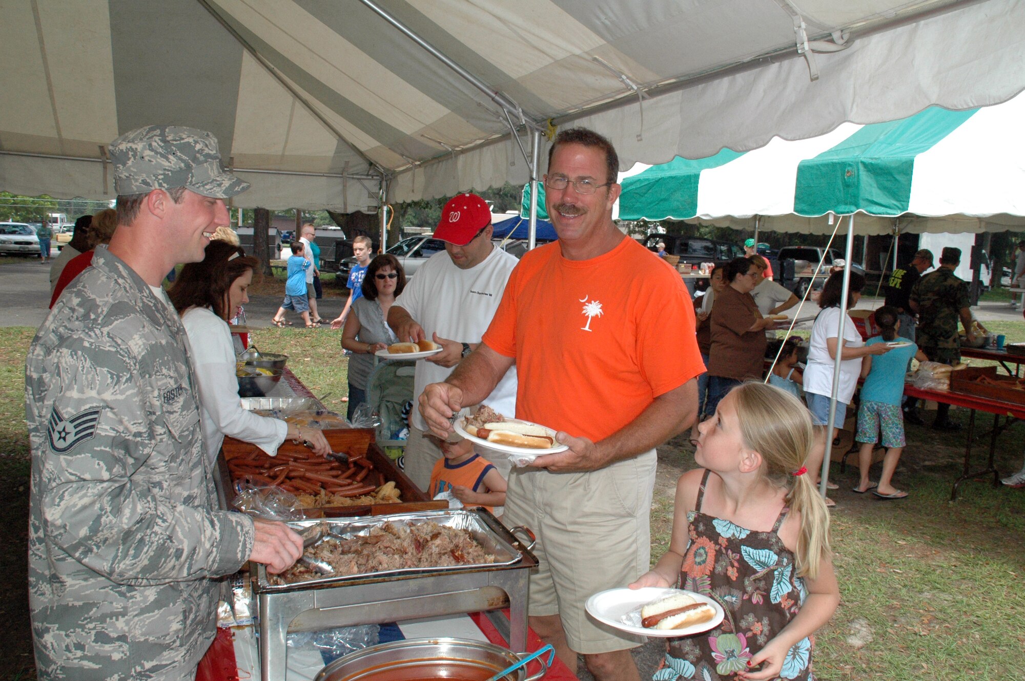 The annual Charleston Air Force Base Picnic was held at Charleston Air Force Base on June 6, 2009 from 11 a.m. to 4 p.m.  The event was fun for every member of the 315th family that participated.  There was great food, a literal "boat load" of cold beverages and plenty of activities for kids including: jump castles, a blow-up obstacle course, a twirling fair ride, animals and playground equipment.  Several reservists even brought out the family pet for the occasion. (U.S. Air Force photo/Capt. Wayne Capps)