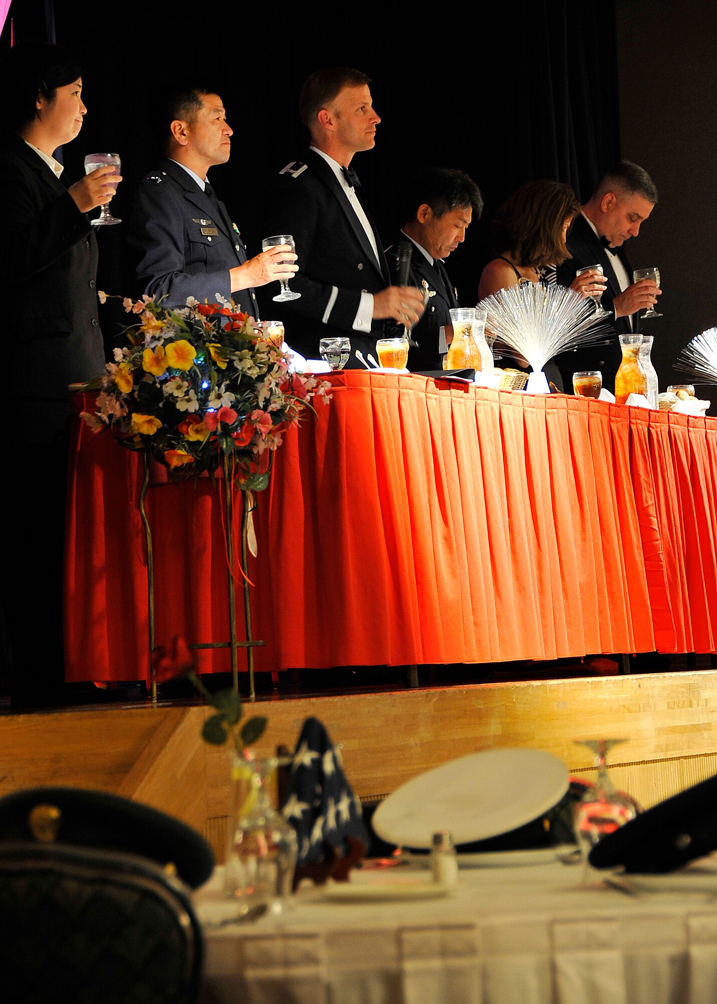 MISAWA AIR BASE, Japan -- Col. RC Craig, 35th Fighter Wing vice commander and his official party make several toasts during the 3rd Annual Bilateral Enlisted Dining-Out June 5, 2009. This was Colonel Craig's first dining-out as the 35th Fighter Wing vice commander. (U.S. Air Force photo by Senior Airman Chad C. Strohmeyer)