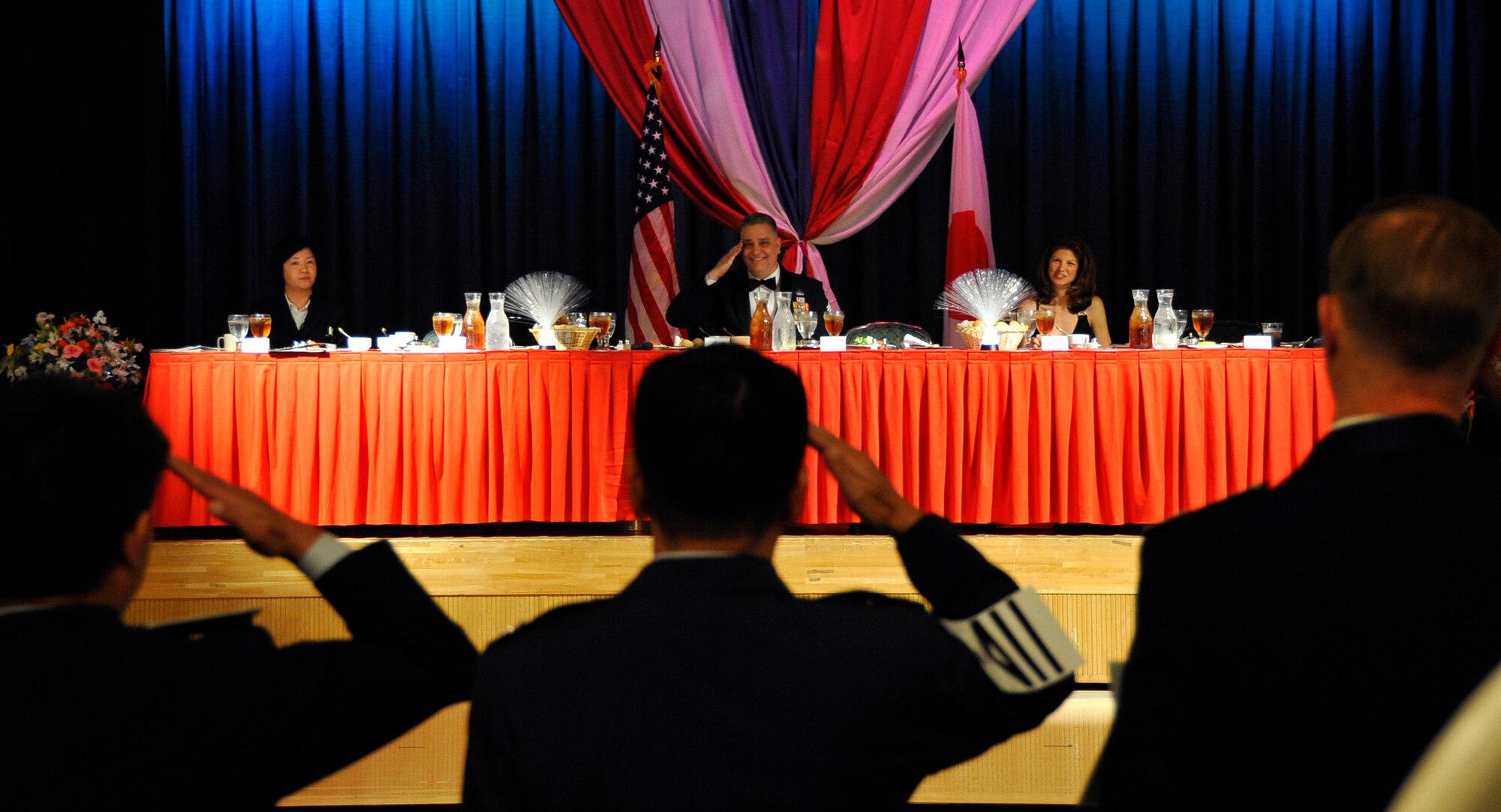 MISAWA AIR BASE, Japan – During the 3rd Annual Bilateral Enlisted Dining-Out, Col. RC Craig, 35th Fighter Wing vice commander, and Japan Air Self-Defense Force officers face the head table after drinking from the “grog bowl,” June 5, 2009. This event marks Chief Price’s last dining-out; he retires from the Air Force June 19. (U.S. Air Force photo by Senior Airman Chad C. Strohmeyer)