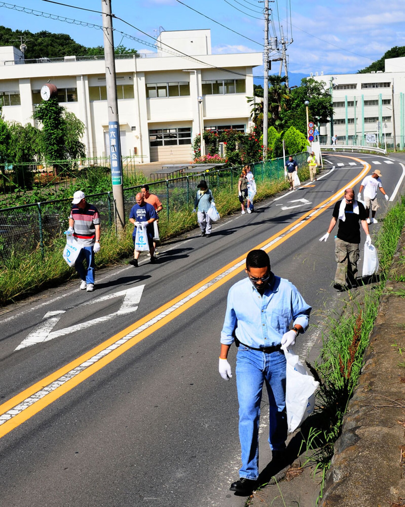 MIZUHO, Japan --  30 Team Yokota members participated in the 27th Annual Mizuho Town Cleanup June 7, as part of Japan's environmental month. The purpose of this event was to make Mizuho a better place to live by working together to promote environment awareness.  (U.S. Air Force photo/Airman First Class Devin Doskey)  