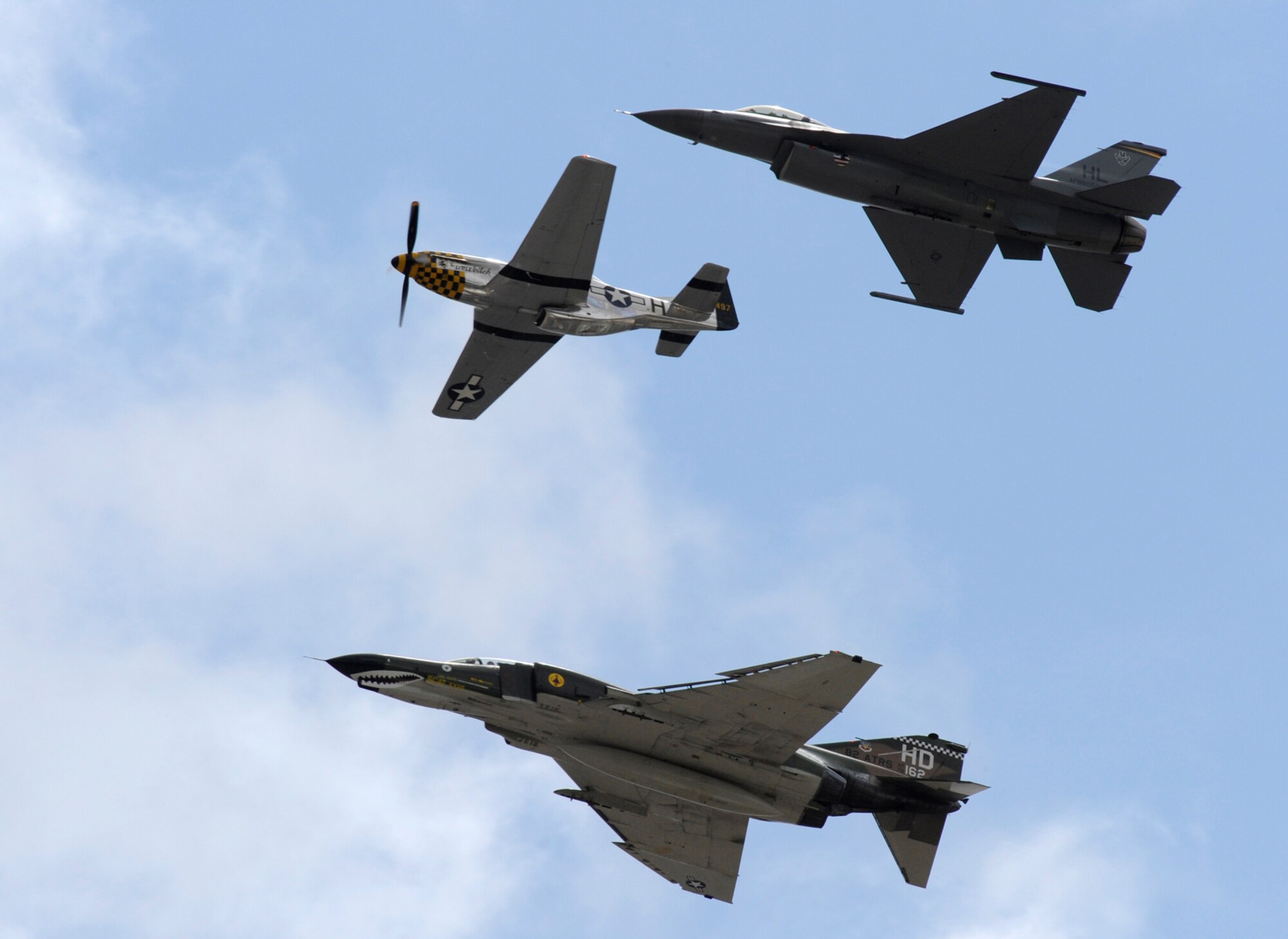 Three-Ship heritage flight at Hill Air Force Base, Utah Open House June 7, 2009. The flight included a P-51, F-16, and F-4. (U.S. Air Force photo/Billy Arrowood  