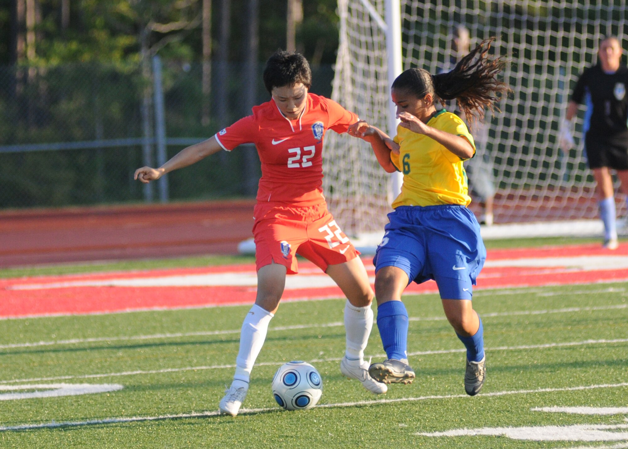 Brazil and The Republic of South Korea compete during the 5th CISM Women’s Soccer Championship at Biloxi High School Stadium 6 June.  The CISM tournament, hosted by Keesler Air Force Base, includes teams from Brazil, Canada, France, Germany, The Netherlands, The Republic of South Korea and the United States.  Matches are being held June 6 to 13, with the Gold match June 13 at 2 p.m.  Organizers say the tournament gives teams and people who attend a chance to develop bonds and life-long friendships between the countries and a chance to learn about one another’s cultural similarities and differences.  (U.S. Air Force photo by Kemberly Groue)