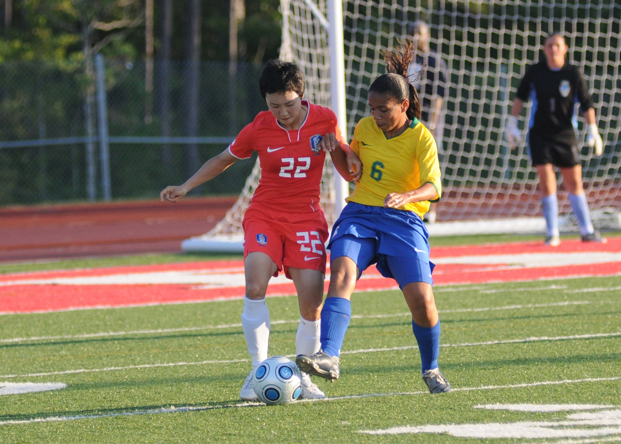 Brazil and The Republic of South Korea compete during the 5th CISM Women’s Soccer Championship at Biloxi High School Stadium 6 June.  The CISM tournament, hosted by Keesler Air Force Base, includes teams from Brazil, Canada, France, Germany, The Netherlands, The Republic of South Korea and the United States.  Matches are being held June 6 to 13, with the Gold match June 13 at 2 p.m.  Organizers say the tournament gives teams and people who attend a chance to develop bonds and life-long friendships between the countries and a chance to learn about one another’s cultural similarities and differences.  (U.S. Air Force photo by Kemberly Groue)