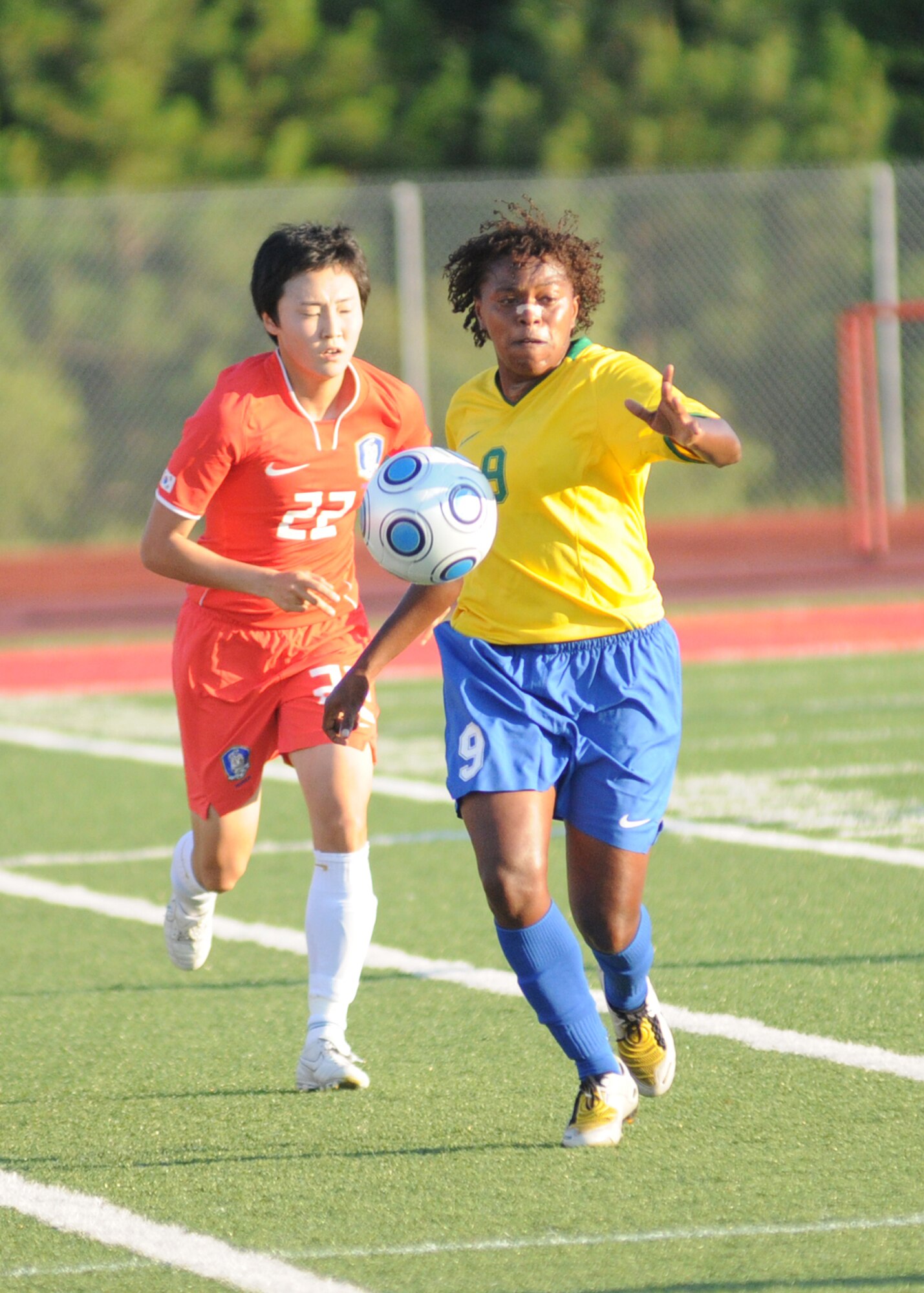Brazil and The Republic of South Korea compete during the 5th CISM Women’s Soccer Championship at Biloxi High School Stadium 6 June.  The CISM tournament, hosted by Keesler Air Force Base, includes teams from Brazil, Canada, France, Germany, The Netherlands, The Republic of South Korea and the United States.  Matches are being held June 6 to 13, with the Gold match June 13 at 2 p.m.  Organizers say the tournament gives teams and people who attend a chance to develop bonds and life-long friendships between the countries and a chance to learn about one another’s cultural similarities and differences.  (U.S. Air Force photo by Kemberly Groue)