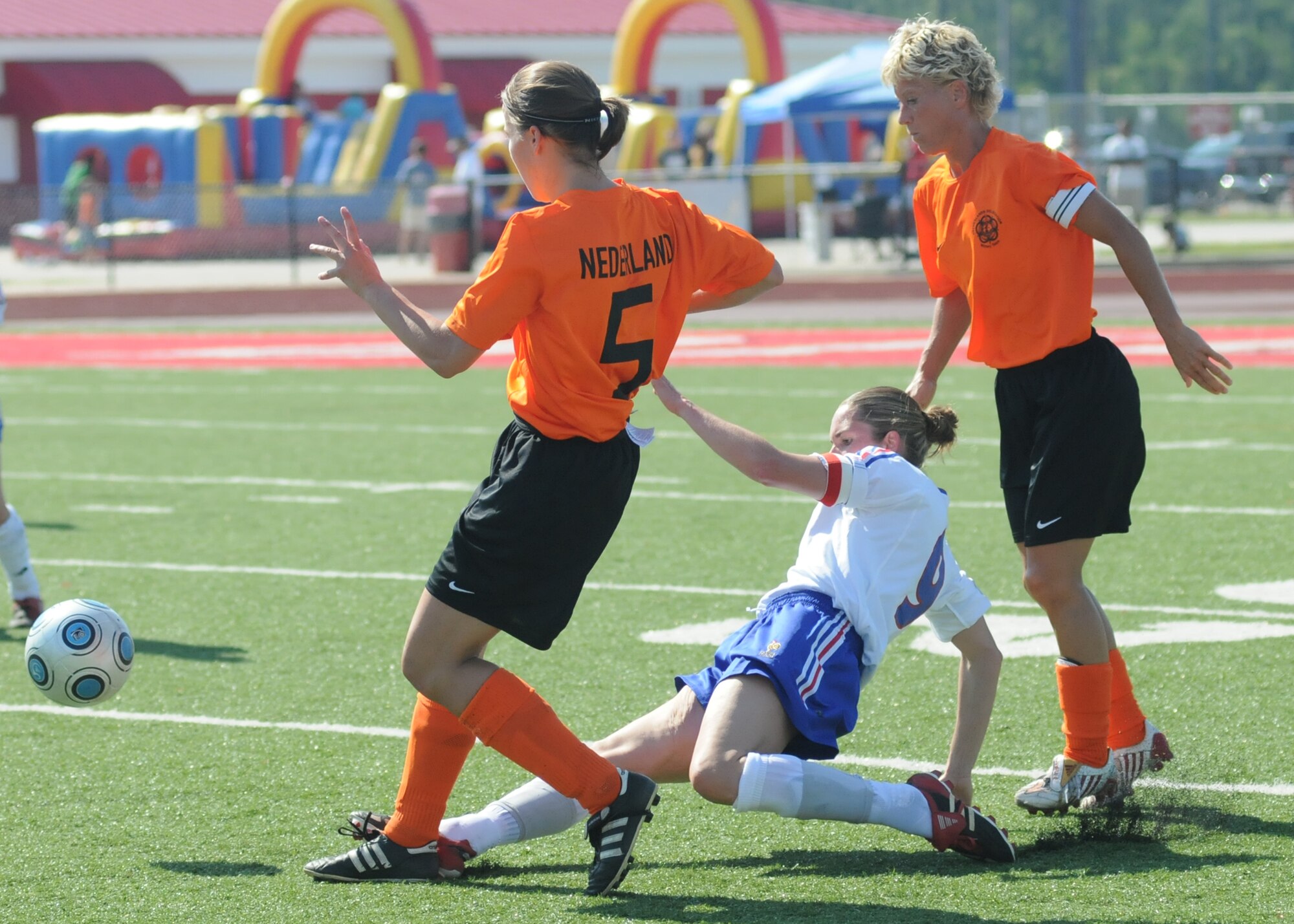 The Netherlands and France compete during the 5th CISM Women’s Soccer Championship at Biloxi High School Stadium 6 June.  The CISM tournament, hosted by Keesler Air Force Base, includes teams from Brazil, Canada, France, Germany, The Netherlands, The Republic of South Korea and the United States.  Matches are being held June 6 to 13, with the Gold match June 13 at 2 p.m.  Organizers say the tournament gives teams and people who attend a chance to develop bonds and life-long friendships between the countries and a chance to learn about one another’s cultural similarities and differences.  (U.S. Air Force photo by Kemberly Groue)