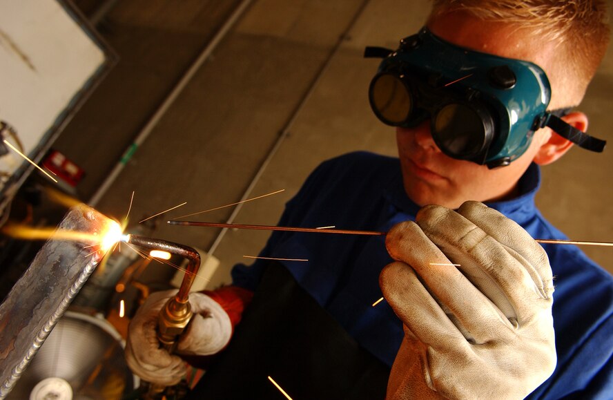 Senior Airman Christopher Swenson, 18th Logistics Readiness Squadron vehicular equipment maintenance journeyman, practices shielded metal arc welding June 4 at Kadena Air Base, Japan. Personnel from vehicle mechanics and body shop  are completing a newly implemented welding course at the Pacific Air Forces Transportation Training Center.
(U.S. Air Force photo/Tech. Sgt. Rey Ramon)  