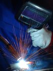 Airmen and local nationals practice tungsten inert gas welding June 4 at Kadena Air Base, Japan. Personnel from vehicle mechanics and body shop  are completing a newly implemented welding course at the Pacific Air Forces Transportation Training Center.   (U.S. Air Force photo/Tech. Sgt. Rey Ramon)     