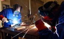 Airmen and local nationals practice tungsten inert gas and oxyacetylene welding June 4 at Kadena Air Base, Japan. Personnel from vehicle mechanics and body shop  are completing a newly implemented welding course at the Pacific Air Forces Transportation Training Center.    (U.S. Air Force photo/Tech. Sgt. Rey Ramon)    