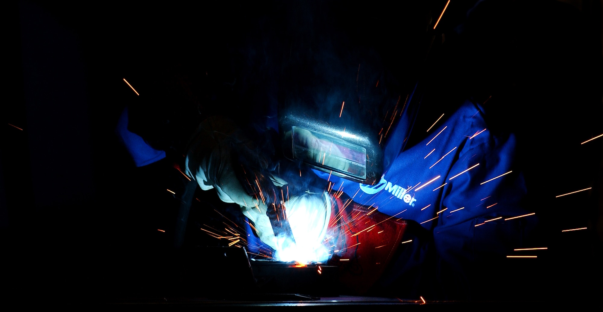 Airmen and local nationals practice tungsten inert gas welding June 4 at Kadena Air Base, Japan. Personnel from vehicle mechanics and body shop  are completing a newly implemented welding course at the Pacific Air Forces Transportation Training Center.    (U.S. Air Force photo/Tech. Sgt. Rey Ramon)        