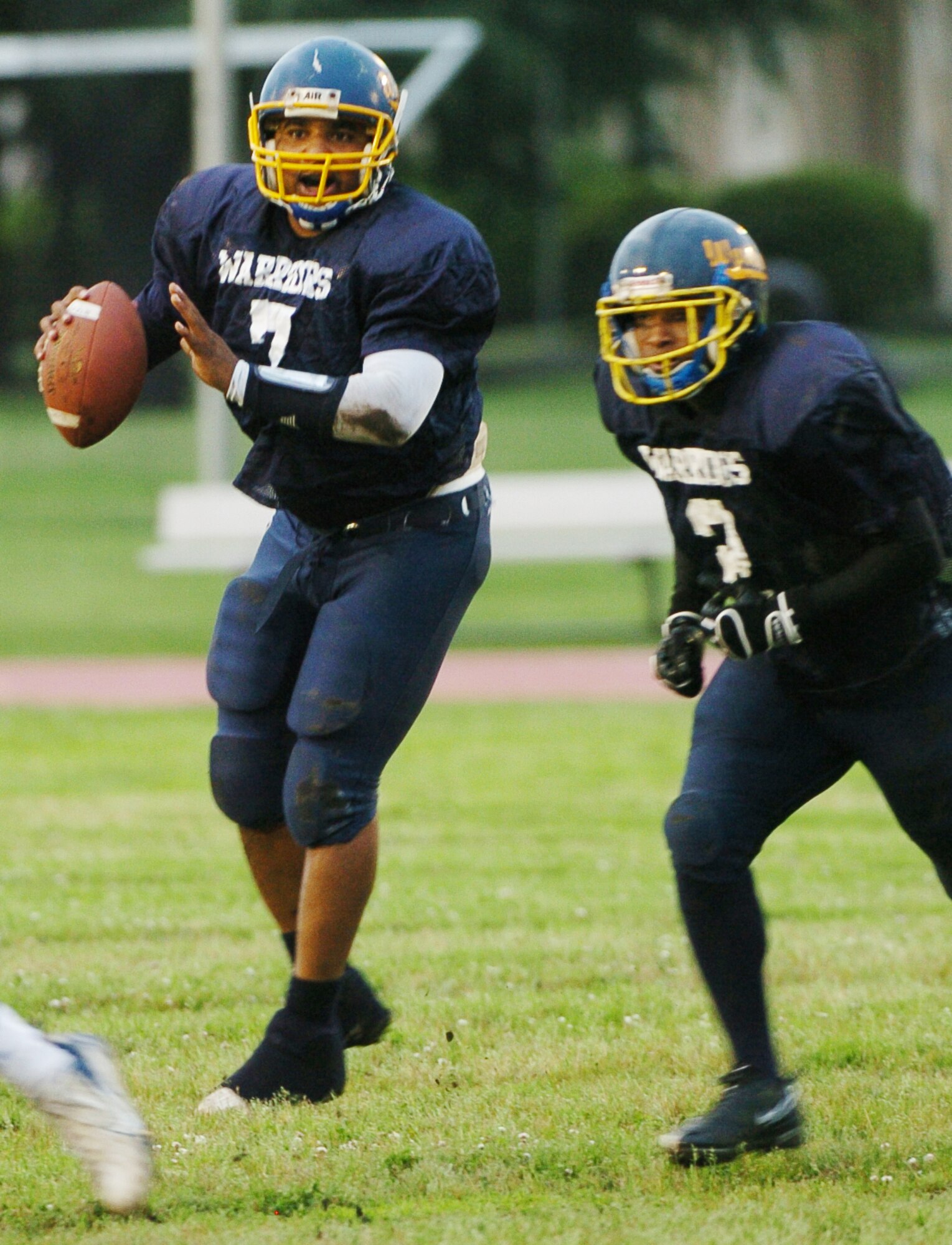 YOKOTA AIR BASE, Japan -- Yokota Warriors' quarterback Ryan Jones sets up in the pocket June 6 during the Warriors' 22-12 win over the Misawa Jets in U.S. Forces Japan-American Football League action. Jones passed for 150 yards on the night, including a 73-yard touchdown toss to Michael Mathis. The win marked Yokota's first of the season, while Misawa dropped to 1-2. The Warriors' final home game at Bonk Field is set for 4 p.m. June 27 vs. Kadena. (U.S. Air Force photo/Master Sgt. Matt Summers)