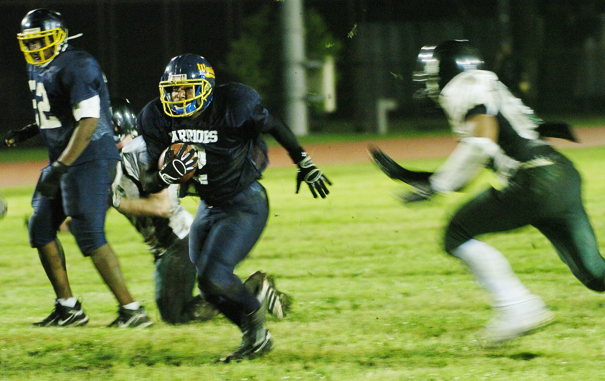 YOKOTA AIR BASE, Japan -- Yokota running back Dell Washington scores from 12 yards out June 6 during the Warriors' 22-12 win over the Misawa Jets in U.S. Forces Japan-American Football League action. The win marked Yokota's first of the season, while Misawa dropped to 1-2. The Warriors' final home game at Bonk Field is set for 4 p.m. June 27 vs. Kadena. (U.S. Air Force photo/Master Sgt. Matt Summers)
