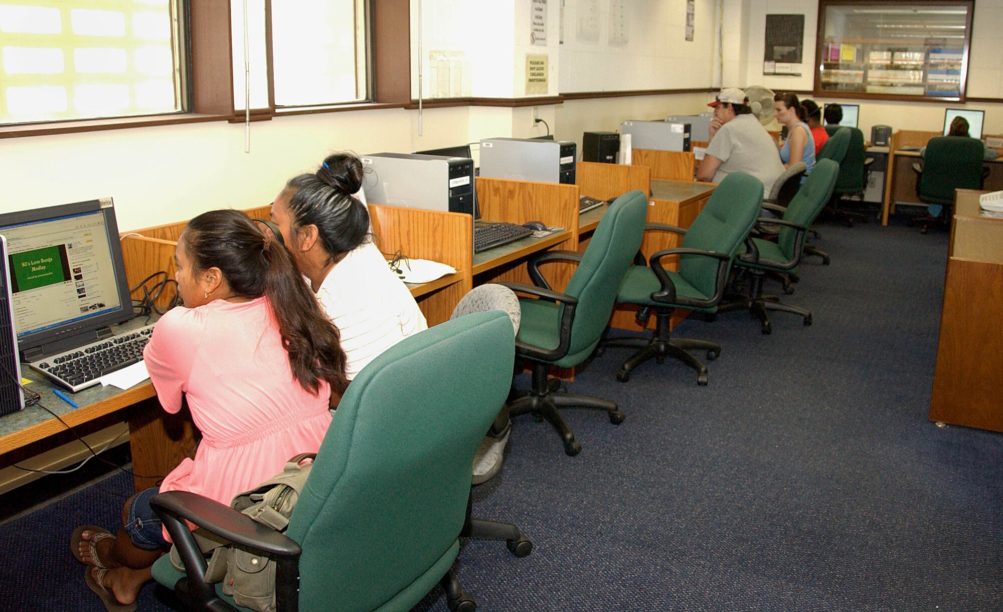 ANDERSEN AIR FORCE BASE, Guam -- Team Andersen members use the library's computer and internet access May 27 here.  Approximately 1,500 patrons use the computer lab monthly. (U.S. Air Force photo by Airman Carissa Wolff)                                