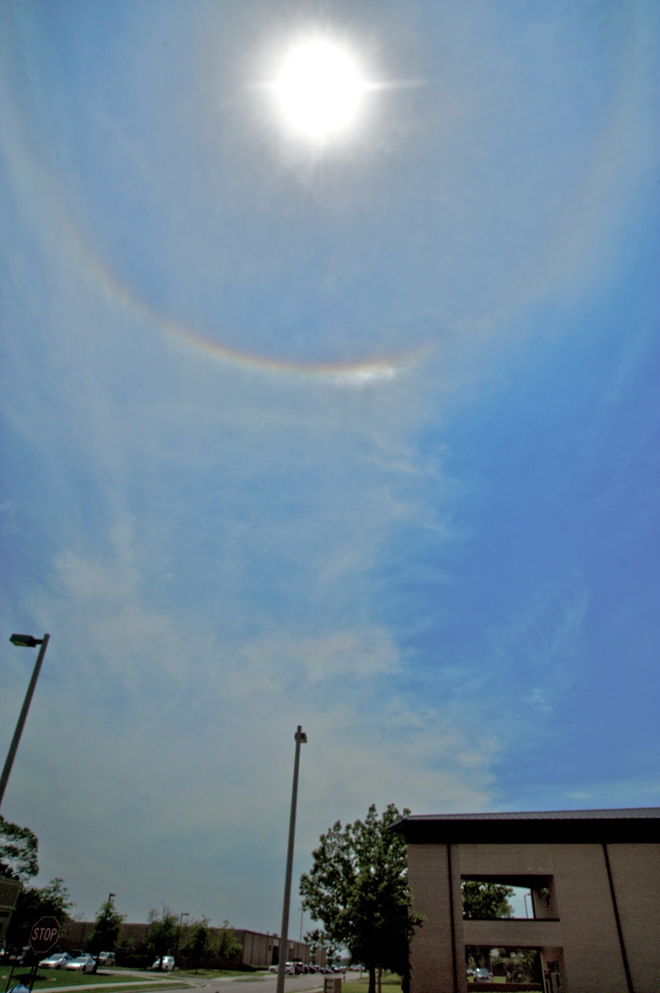 KEESLER AIR FORCE BASE, MISS -- If you saw a circular object around the sun in the afternoon sky, it was not a UFO, but a sundog. Many Citizen Airmen across the base took the time to appreciate this weather phenomenon that require special atmospheric conditions to occur. Sundogs are caused by refracted light through the prism of high level clouds made up of tiny ice crystals. The sun has to be at the right angle for the refraction to occur. Often, high-level clouds precede the rainfall from an oncoming frontal system. (U.S. Air Force Photo by Maj. Chad E. Gibson)