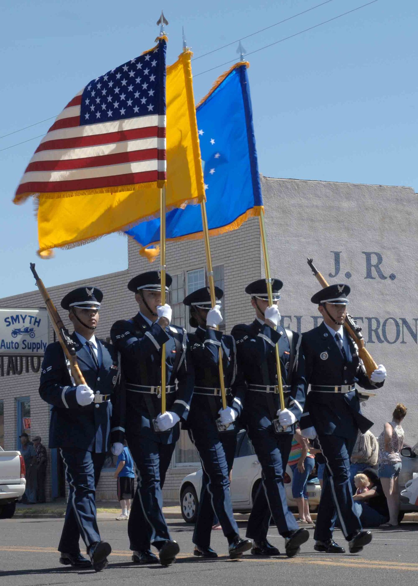 CANNON AIR FORCE BASE, N.M. -- The base Honor Guard Base marches in downtown Clovis, N.M. during the 39th Annual Pioneer Days Parade on June 6. The Honor Guard received the most points in the parade. winning the sweepstakes.  (U.S. Air Force photo/ Airman 1st Class James Bell) 