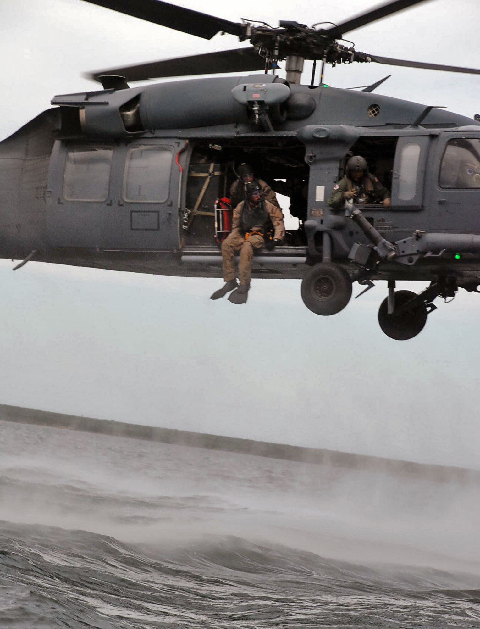 LAUGHLIN AIR FORCE BASE, Texas –Pararescue Airmen from Davis-Monthan Air Force Base, Ariz. get ready to jump into Lake Amistad to perform a mock rescue during an exercise at Laughlin and in the surrounding community June 2. The exercise was held to prepare Laughlin, Davis-Monthan and the community for any potential natural disasters that could occur in the future. (U.S. Air Force photo by Airman 1st Class Sara Csurilla)