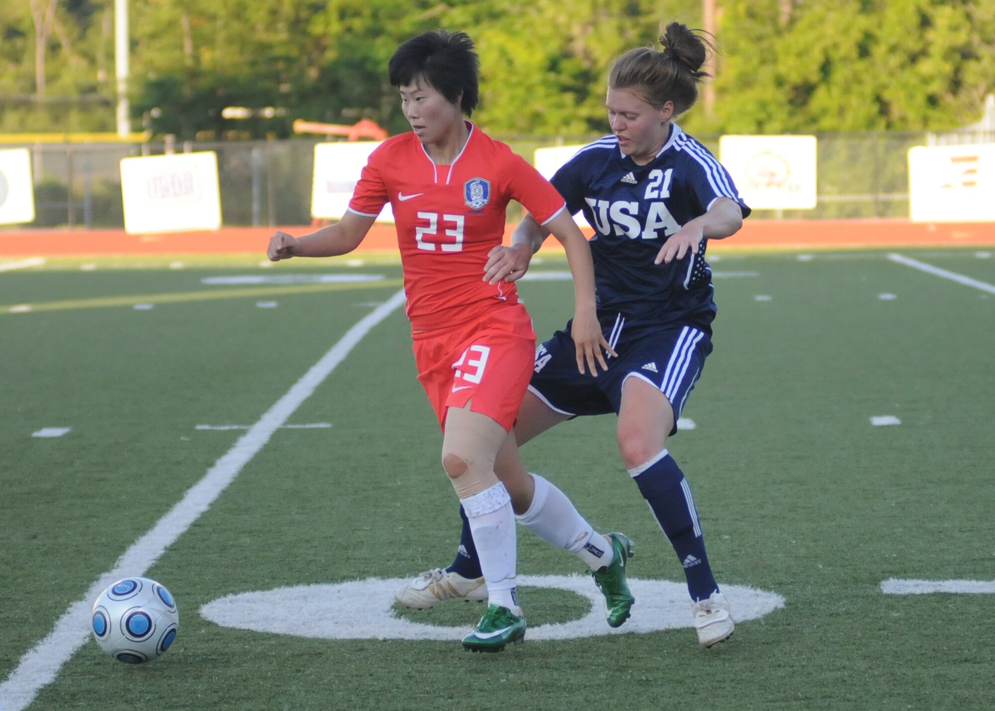 The United States and The Republic of South Korea compete during the 5th CISM Women’s Soccer Championship at Biloxi High School Stadium 7 June.  The CISM tournament, hosted by Keesler Air Force Base, includes teams from Brazil, Canada, France, Germany, The Netherlands, The Republic of South Korea and the United States.  Matches are being held June 6 to 13, with the Gold match June 13 at 2 p.m.  Organizers say the tournament gives teams and people who attend a chance to develop bonds and life-long friendships between the countries and a chance to learn about one another’s cultural similarities and differences.  (U.S. Air Force photo by Kemberly Groue)