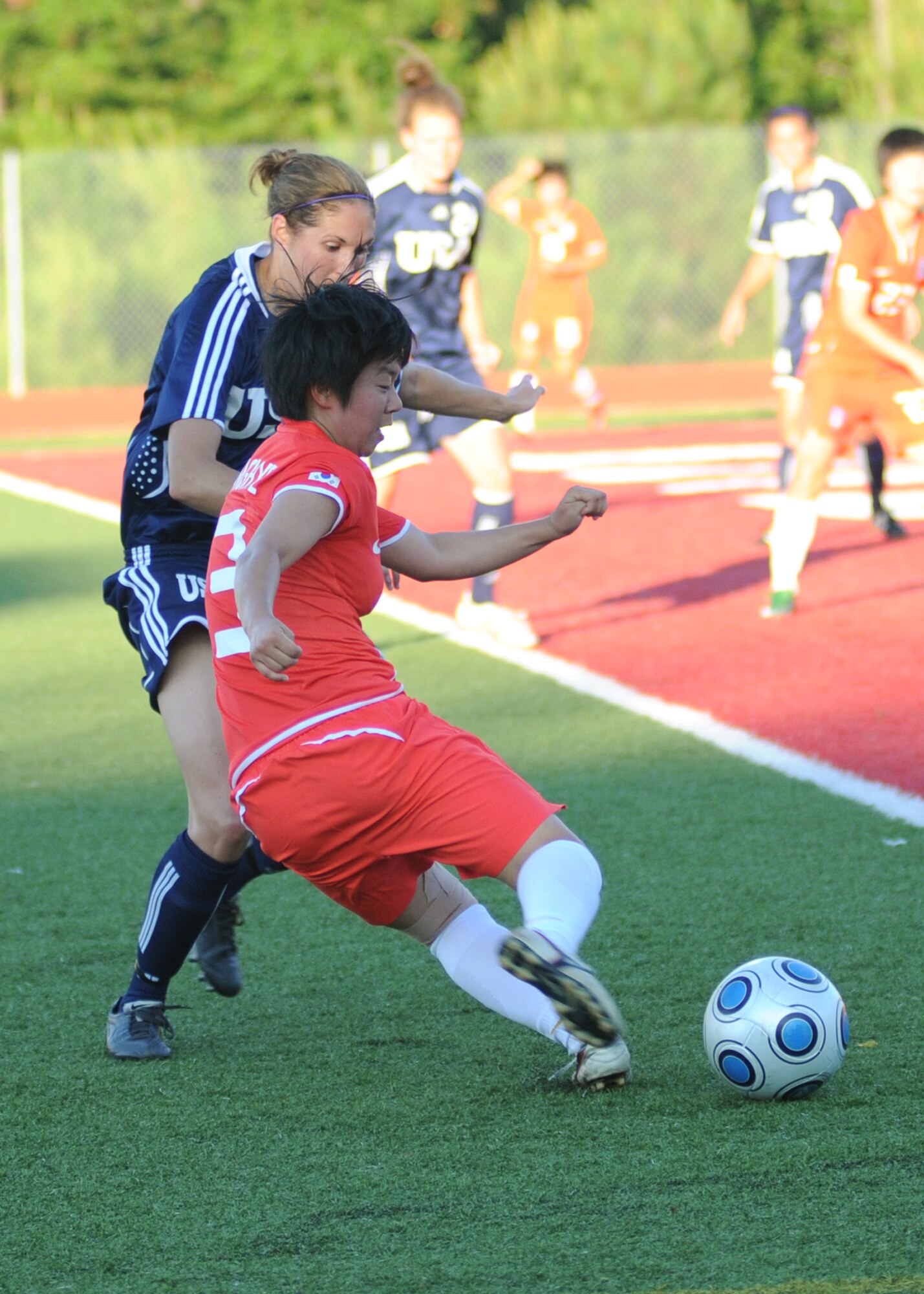 The United States and The Republic of South Korea compete during the 5th CISM Women’s Soccer Championship at Biloxi High School Stadium 7 June.  The CISM tournament, hosted by Keesler Air Force Base, includes teams from Brazil, Canada, France, Germany, The Netherlands, The Republic of South Korea and the United States.  Matches are being held June 6 to 13, with the Gold match June 13 at 2 p.m.  Organizers say the tournament gives teams and people who attend a chance to develop bonds and life-long friendships between the countries and a chance to learn about one another’s cultural similarities and differences.  (U.S. Air Force photo by Kemberly Groue)