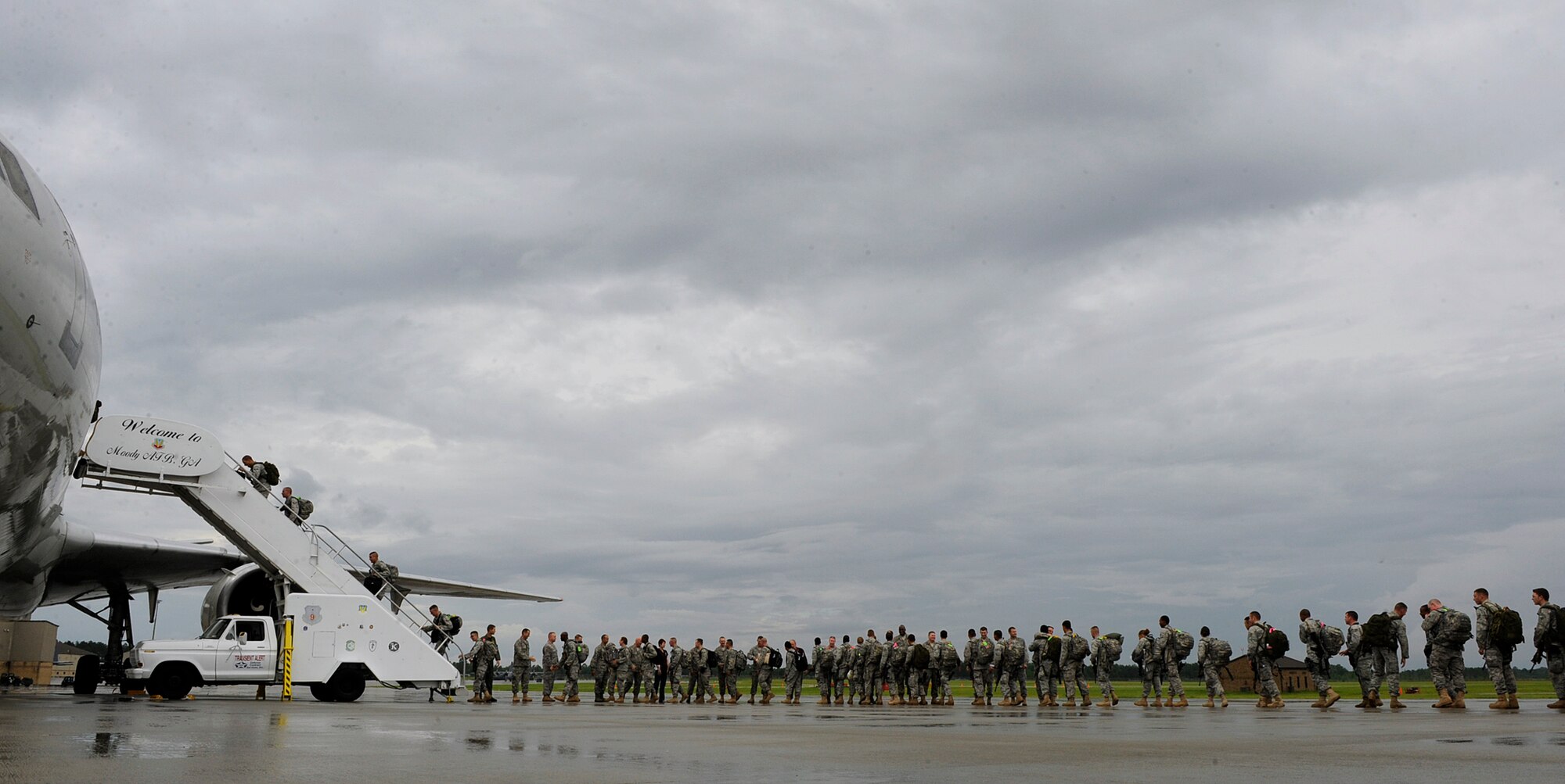 MOODY AIR FORCE BASE, Ga. -- Members from the 822nd Security Forces Squadron prepare to depart for a deployment to Camp Bucca, Iraq, here June 6. While deployed the squadron will perform security operations and serve as convoy escorts. (U.S. Air Force photo by Senior Airman Brittany Barker) 