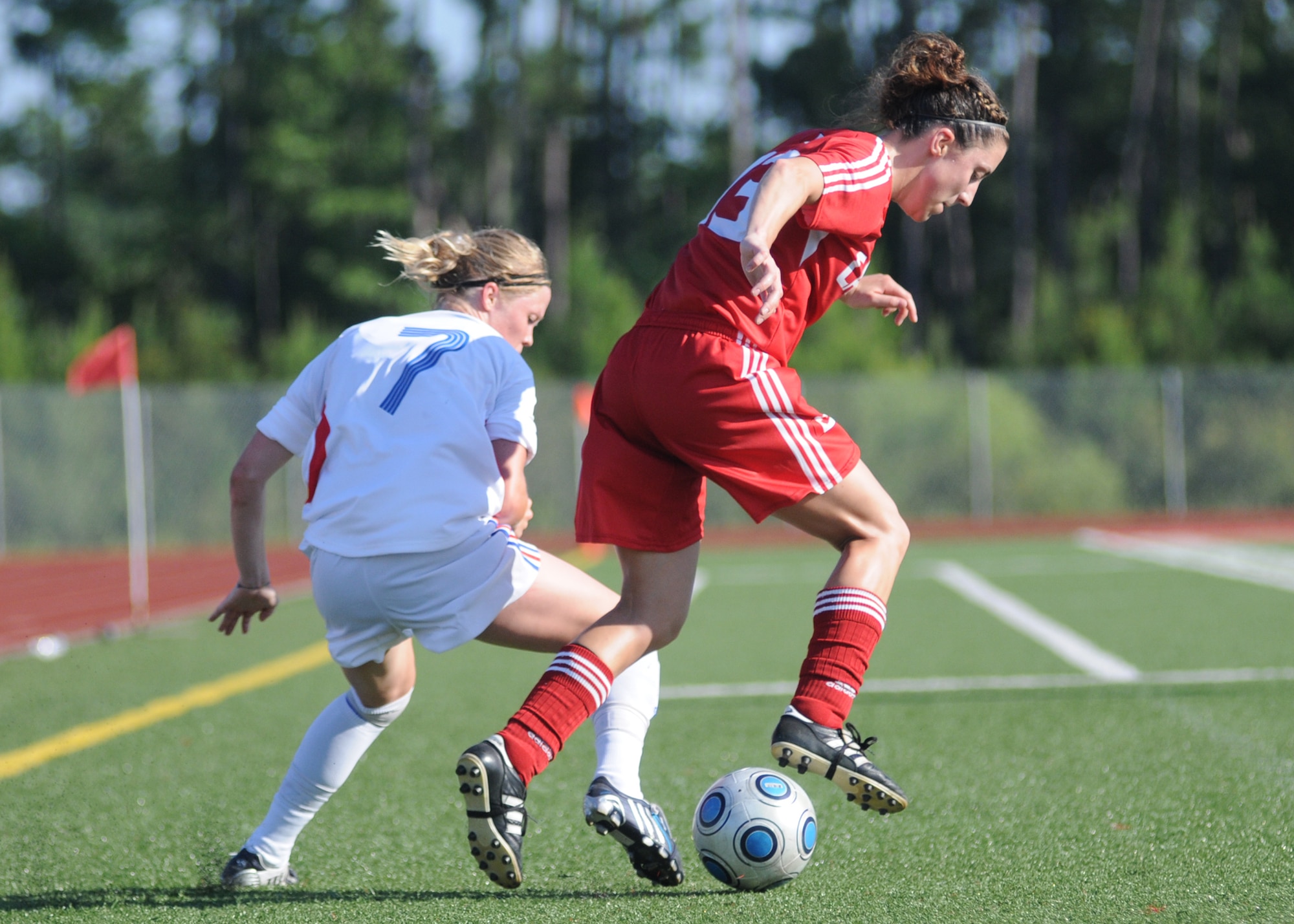Canada and France compete during the 5th CISM Women’s Soccer Championship at Biloxi High School Stadium 7 June.  The CISM tournament, hosted by Keesler Air Force Base, includes teams from Brazil, Canada, France, Germany, The Netherlands, The Republic of South Korea and the United States.  Matches are being held June 6 to 13, with the Gold match June 13 at 2 p.m.  Organizers say the tournament gives teams and people who attend a chance to develop bonds and life-long friendships between the countries and a chance to learn about one another’s cultural similarities and differences.  (U.S. Air Force photo by Kemberly Groue)