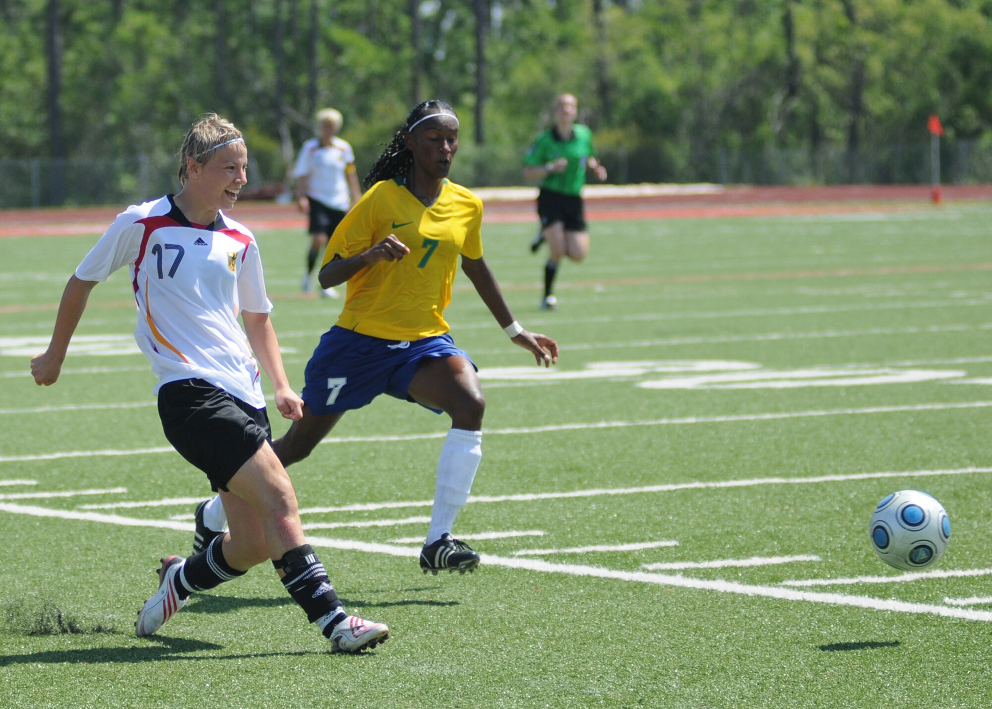 Germany and Brazil compete during the 5th CISM Women’s Soccer Championship at Biloxi High School Stadium 7 June.  The CISM tournament, hosted by Keesler Air Force Base, includes teams from Brazil, Canada, France, Germany, The Netherlands, The Republic of South Korea and the United States.  Matches are being held June 6 to 13, with the Gold match June 13 at 2 p.m.  Organizers say the tournament gives teams and people who attend a chance to develop bonds and life-long friendships between the countries and a chance to learn about one another’s cultural similarities and differences.  (U.S. Air Force photo by Kemberly Groue)