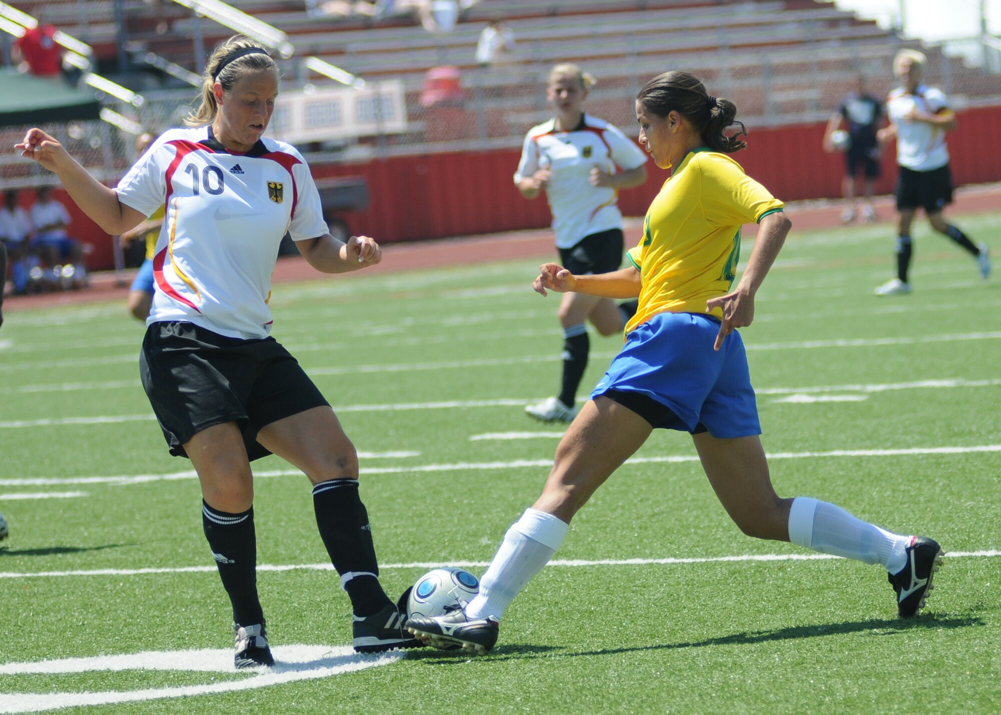 Germany and Brazil compete during the 5th CISM Women’s Soccer Championship at Biloxi High School Stadium 7 June.  The CISM tournament, hosted by Keesler Air Force Base, includes teams from Brazil, Canada, France, Germany, The Netherlands, The Republic of South Korea and the United States.  Matches are being held June 6 to 13, with the Gold match June 13 at 2 p.m.  Organizers say the tournament gives teams and people who attend a chance to develop bonds and life-long friendships between the countries and a chance to learn about one another’s cultural similarities and differences.  (U.S. Air Force photo by Kemberly Groue)