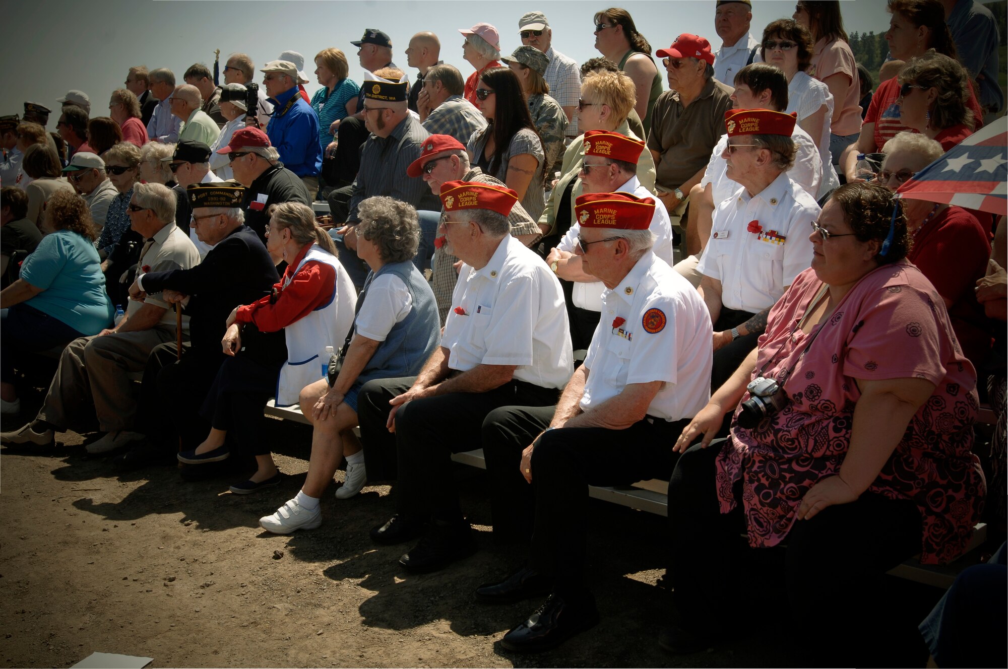 Veterans and members of the Marine Corps League anticipate the National Anthem sung by Linda Lanier. (U.S. Air Force photo/Airman 1st Class Melissa Carlino)