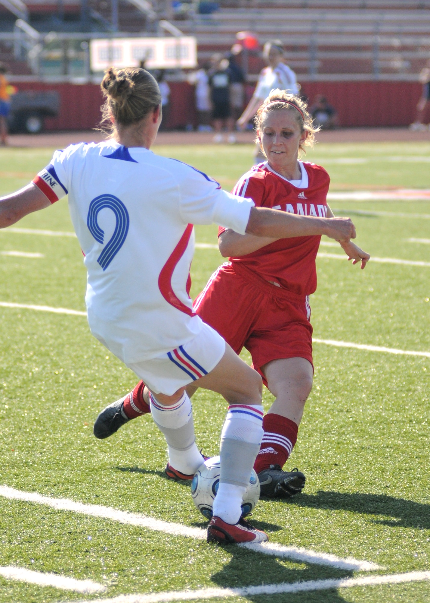Canada and France compete during the 5th CISM Women’s Soccer Championship at Biloxi High School Stadium 7 June.  The CISM tournament, hosted by Keesler Air Force Base, includes teams from Brazil, Canada, France, Germany, The Netherlands, The Republic of South Korea and the United States.  Matches are being held June 6 to 13, with the Gold match June 13 at 2 p.m.  Organizers say the tournament gives teams and people who attend a chance to develop bonds and life-long friendships between the countries and a chance to learn about one another’s cultural similarities and differences.  (U.S. Air Force photo by Kemberly Groue)