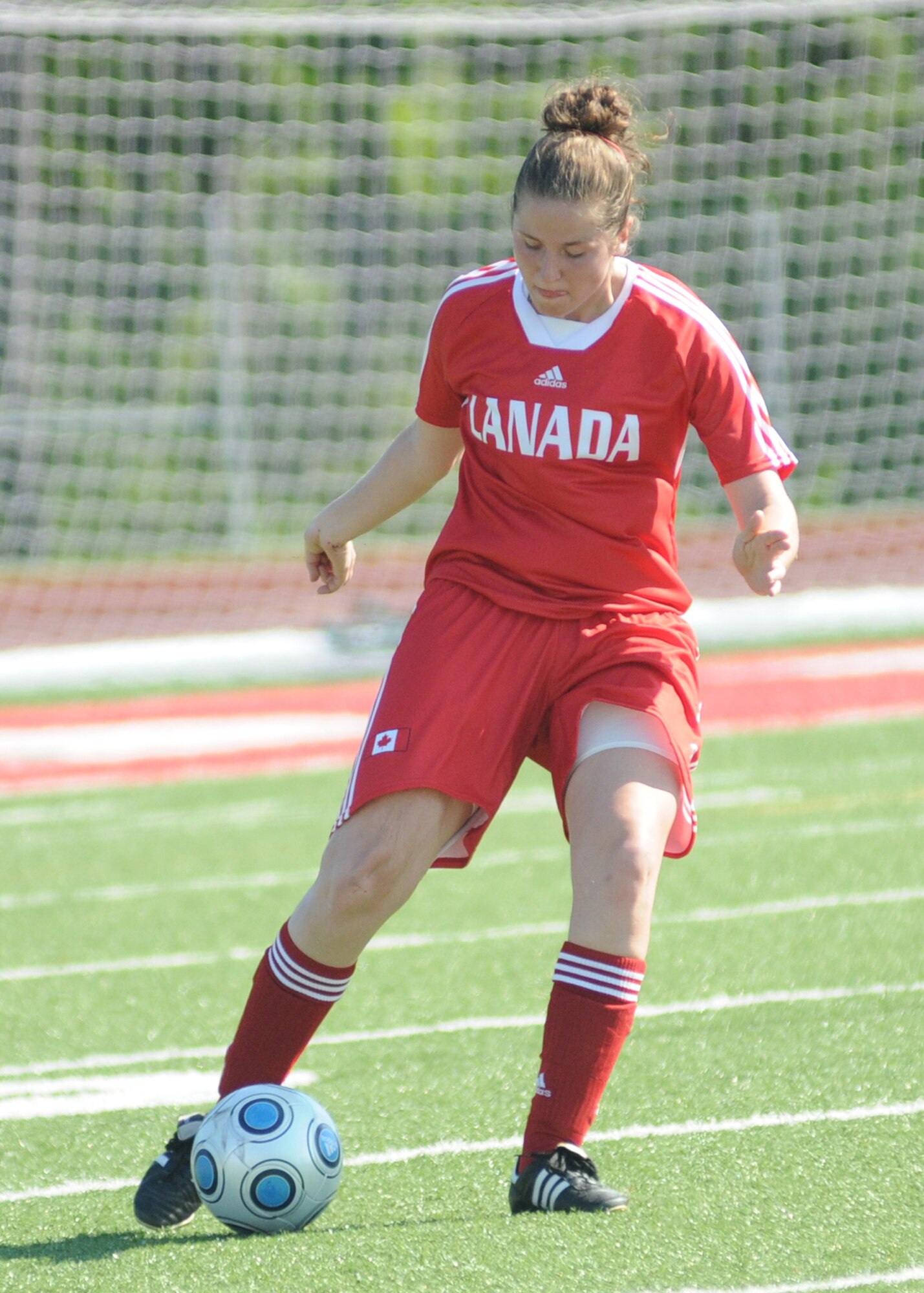 Canada and France compete during the 5th CISM Women’s Soccer Championship at Biloxi High School Stadium 7 June.  The CISM tournament, hosted by Keesler Air Force Base, includes teams from Brazil, Canada, France, Germany, The Netherlands, The Republic of South Korea and the United States.  Matches are being held June 6 to 13, with the Gold match June 13 at 2 p.m.  Organizers say the tournament gives teams and people who attend a chance to develop bonds and life-long friendships between the countries and a chance to learn about one another’s cultural similarities and differences.  (U.S. Air Force photo by Kemberly Groue)