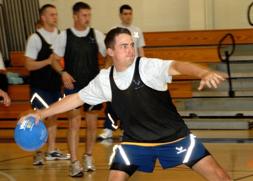 Airman First Class Robert Russ member of the 60th Aerial Port Squadron prepares to throw during the Travis Sports Day dodge ball competition 21 May 2009. (U.S. Air Force photo by Civ/Nan Wylie)