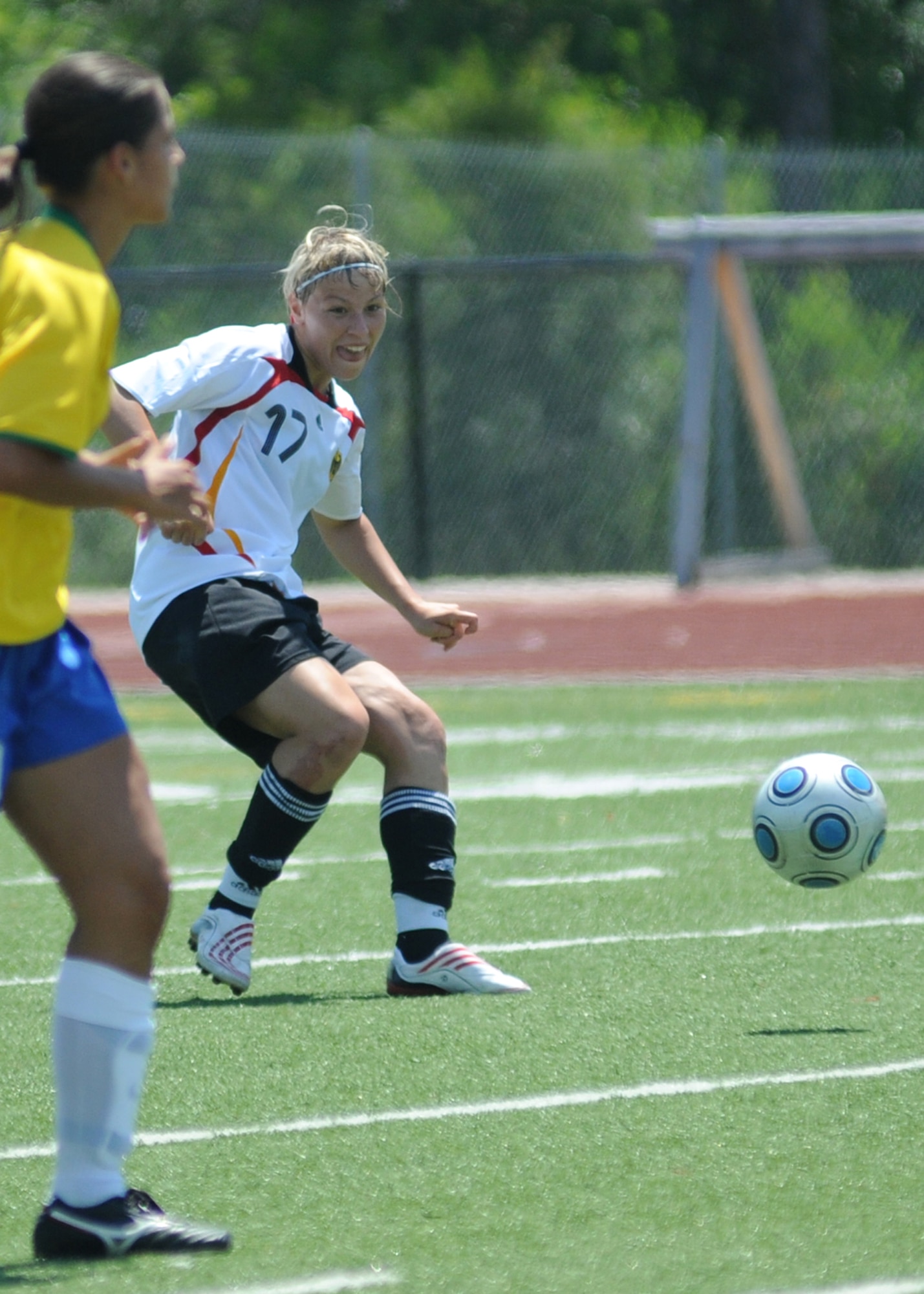 Germany and Brazil compete during the 5th CISM Women’s Soccer Championship at Biloxi High School Stadium 7 June.  The CISM tournament, hosted by Keesler Air Force Base, includes teams from Brazil, Canada, France, Germany, The Netherlands, The Republic of South Korea and the United States.  Matches are being held June 6 to 13, with the Gold match June 13 at 2 p.m.  Organizers say the tournament gives teams and people who attend a chance to develop bonds and life-long friendships between the countries and a chance to learn about one another’s cultural similarities and differences.  (U.S. Air Force photo by Kemberly Groue)