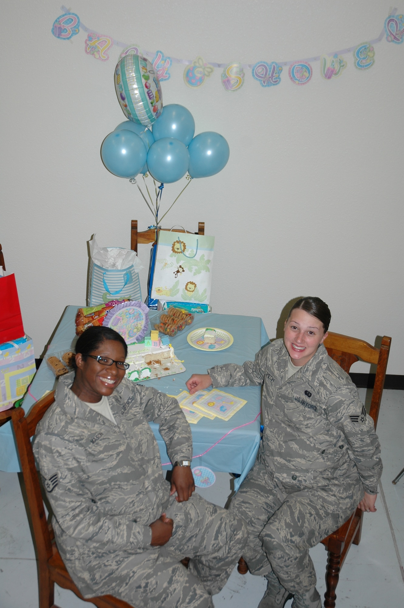 Staff Sgt. Keisha Mason and Senior Airman Jessica Piech, 944th Services Flight, celebrate with a baby shower June 7. (U.S. Air Force photo/Senior Airman Andre Bowser)
