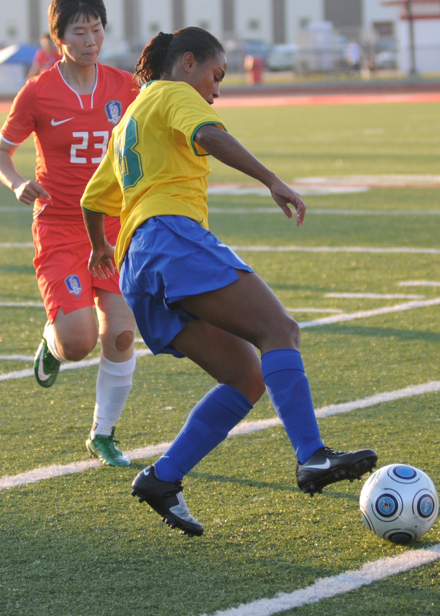 Brazil and The Republic of South Korea compete during the 5th CISM Women’s Soccer Championship at Biloxi High School Stadium 6 June.  The CISM tournament, hosted by Keesler Air Force Base, includes teams from Brazil, Canada, France, Germany, The Netherlands, The Republic of South Korea and the United States.  Matches are being held June 6 to 13, with the Gold match June 13 at 2 p.m.  Organizers say the tournament gives teams and people who attend a chance to develop bonds and life-long friendships between the countries and a chance to learn about one another’s cultural similarities and differences.  (U.S. Air Force photo by Kemberly Groue)